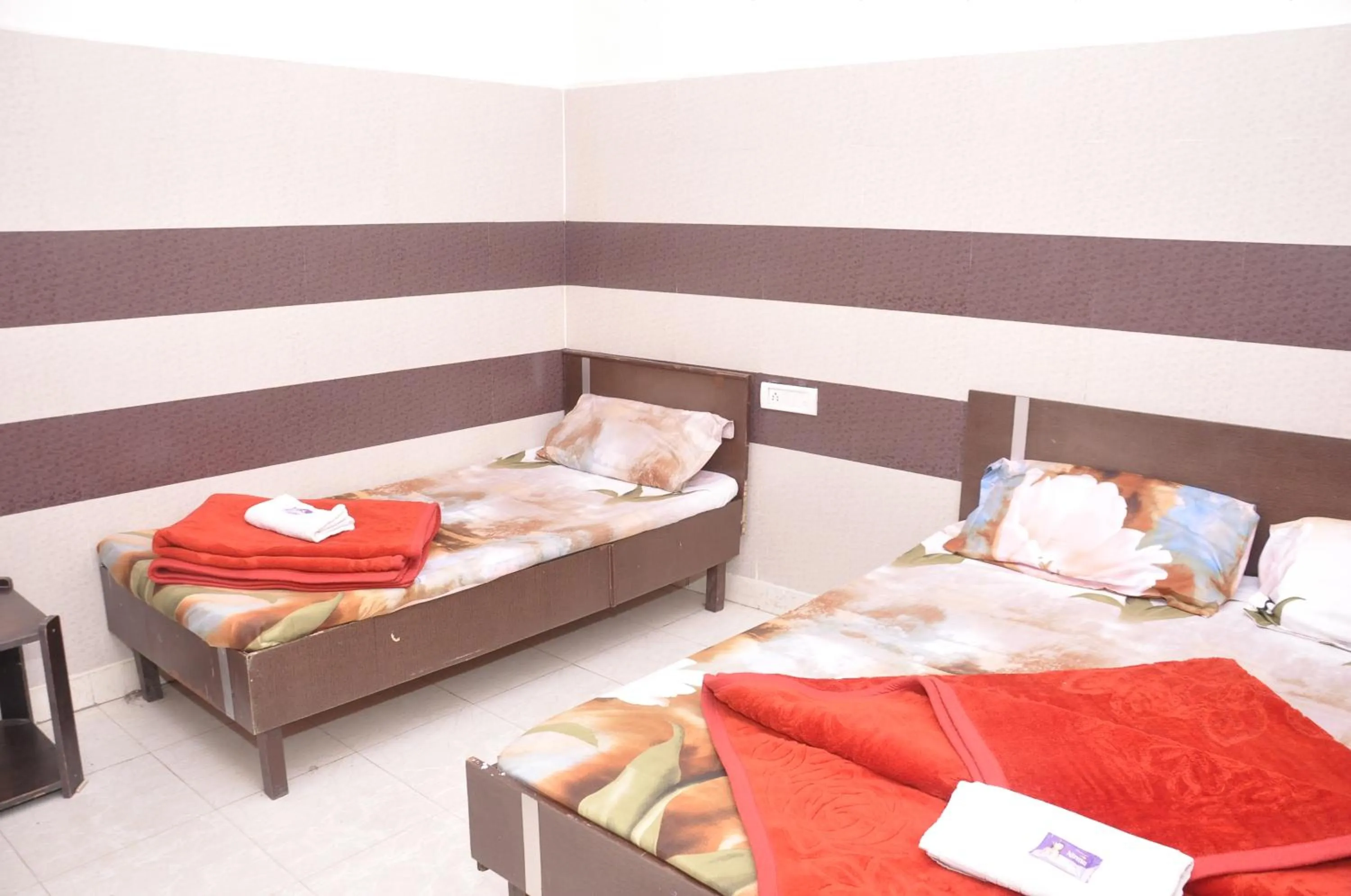 Family, Bed in Asha Guest House