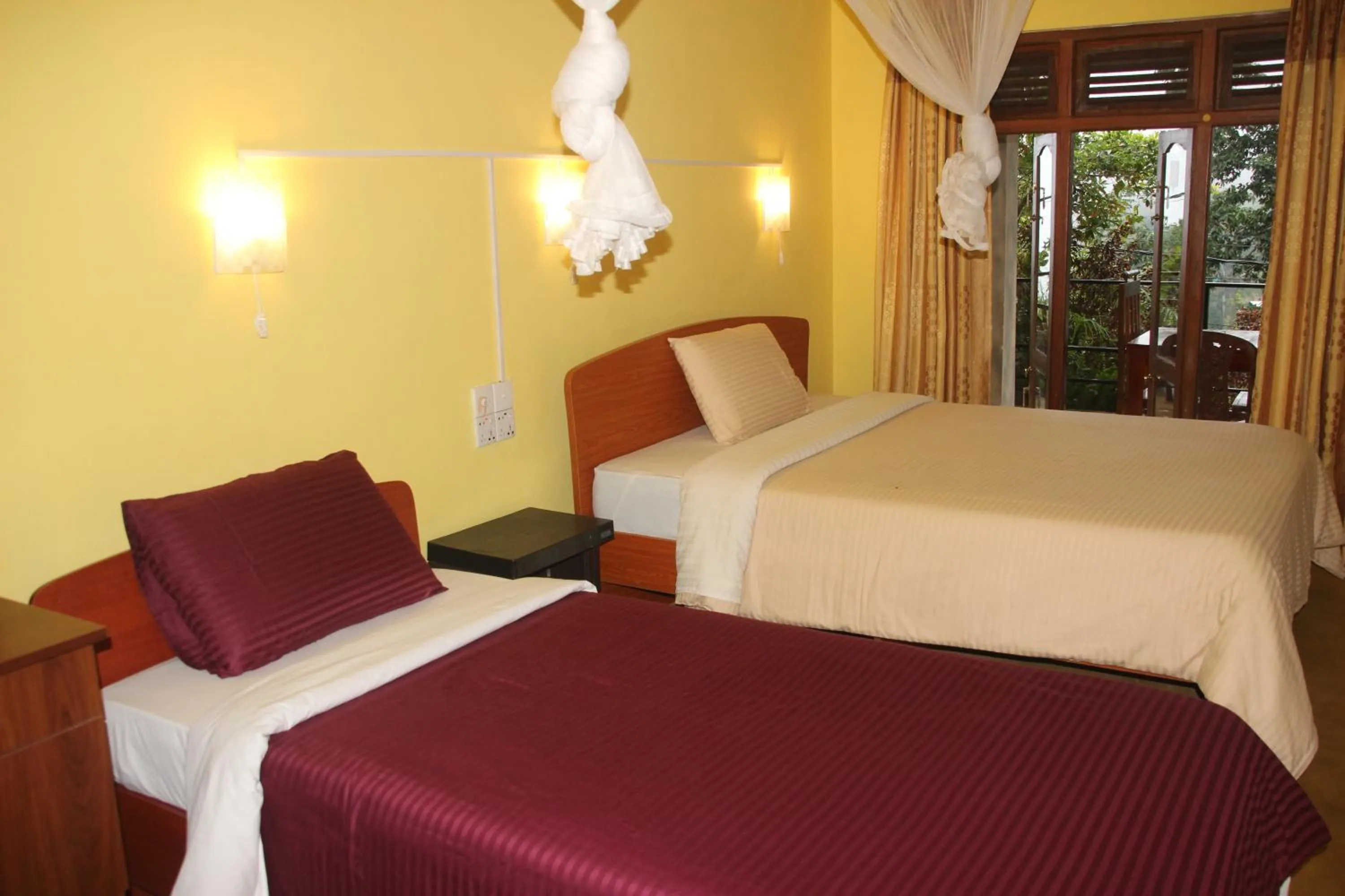 Bedroom, Bed in Welcome Inn