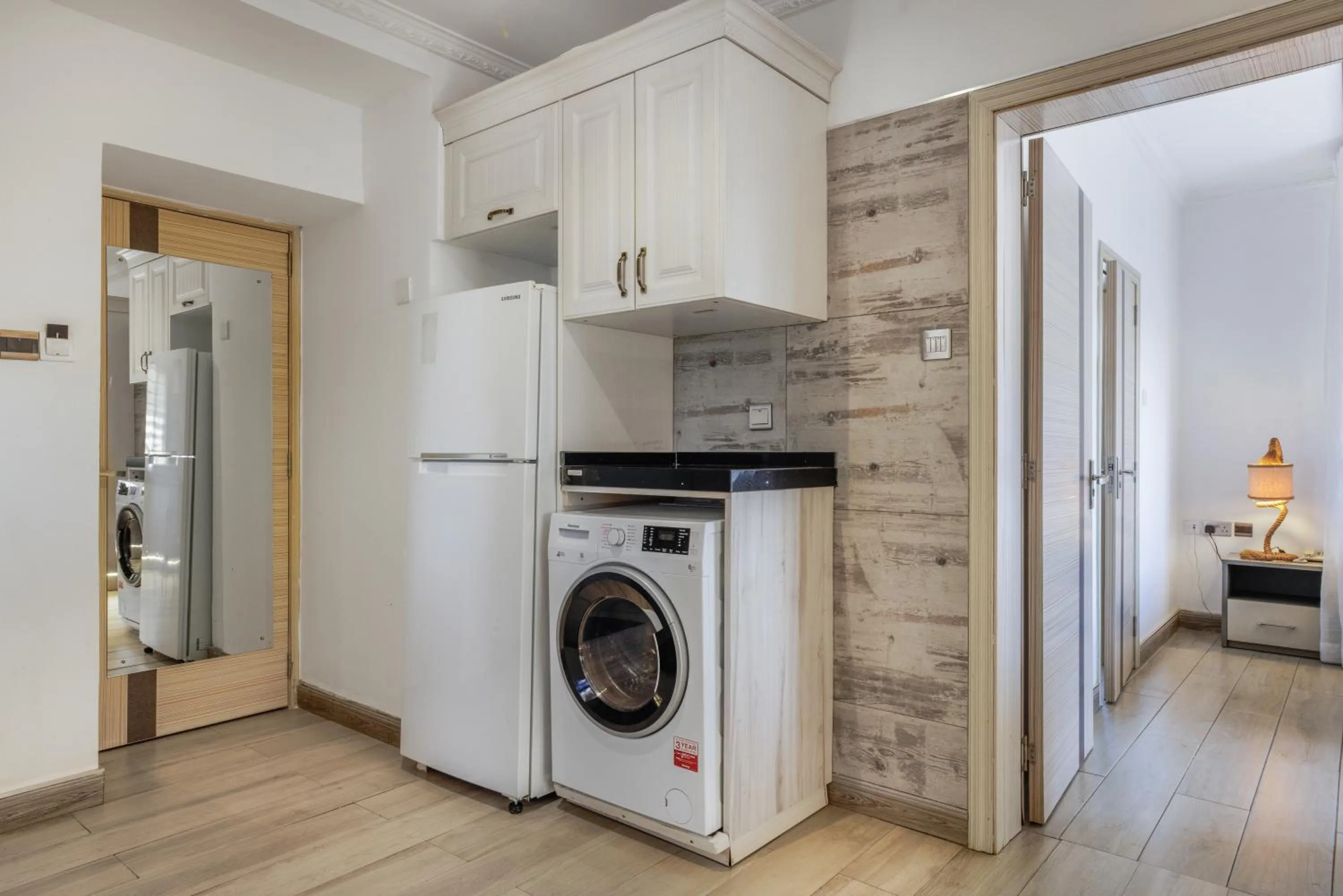 washing machine in Kates Apartments