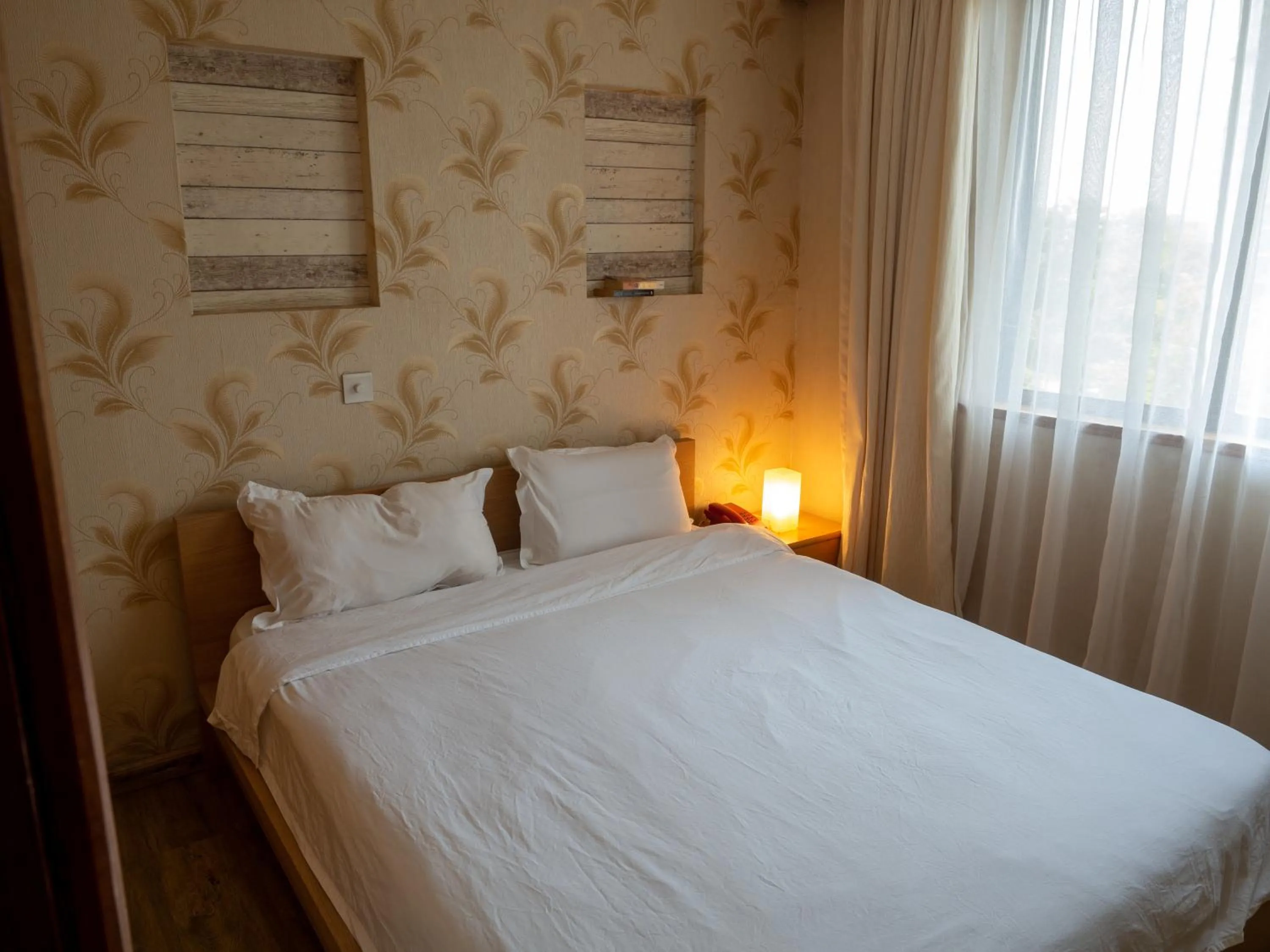 Bed in Kates Apartments