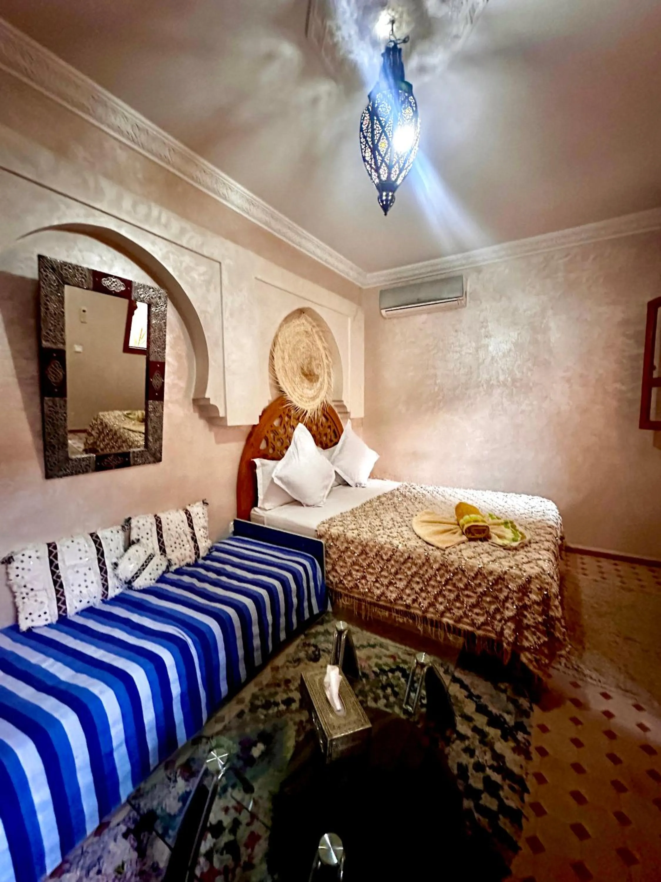 Bed in Riad Jenan Adam