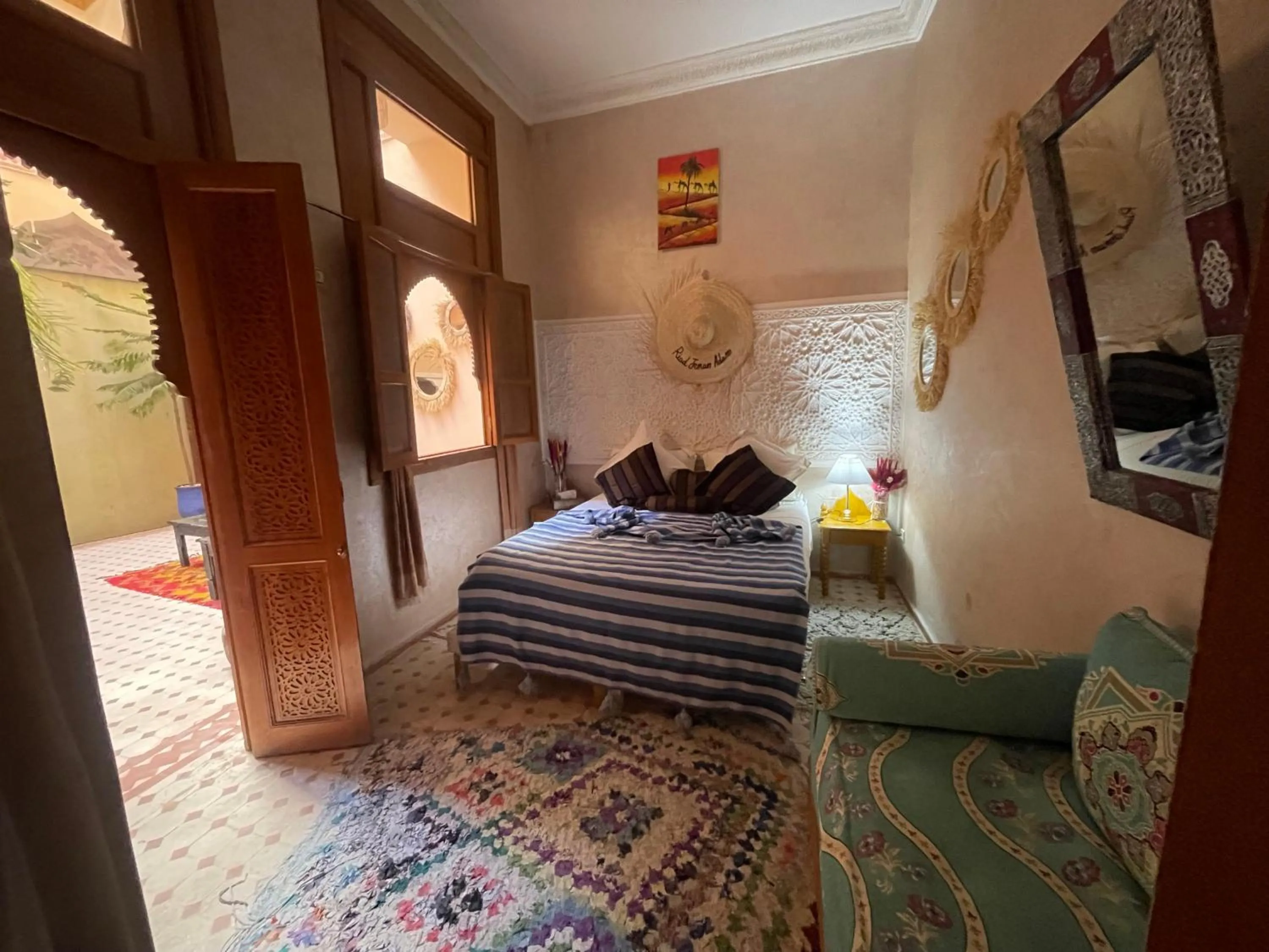 Bed in Riad Jenan Adam