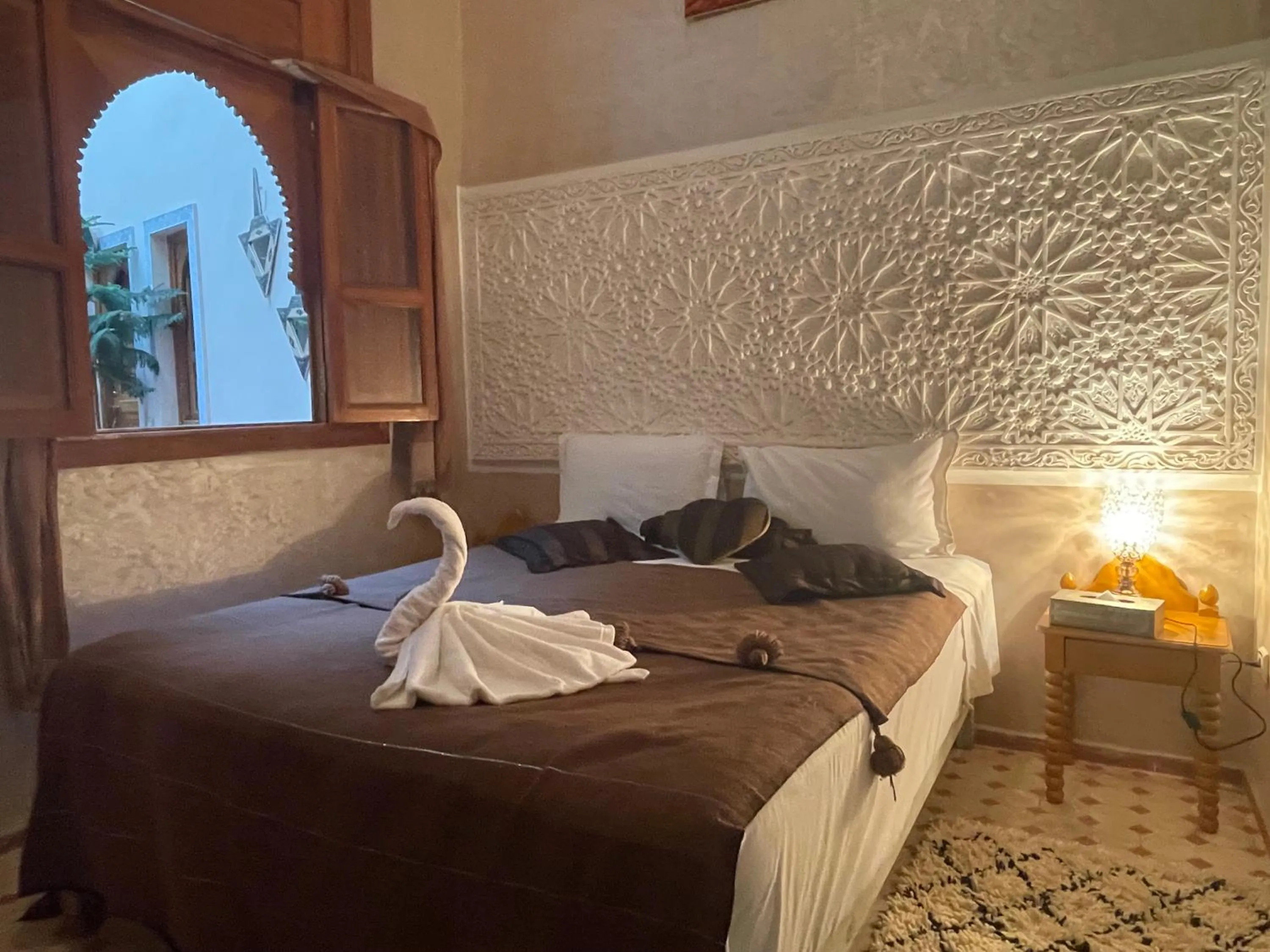 Bed in Riad Jenan Adam