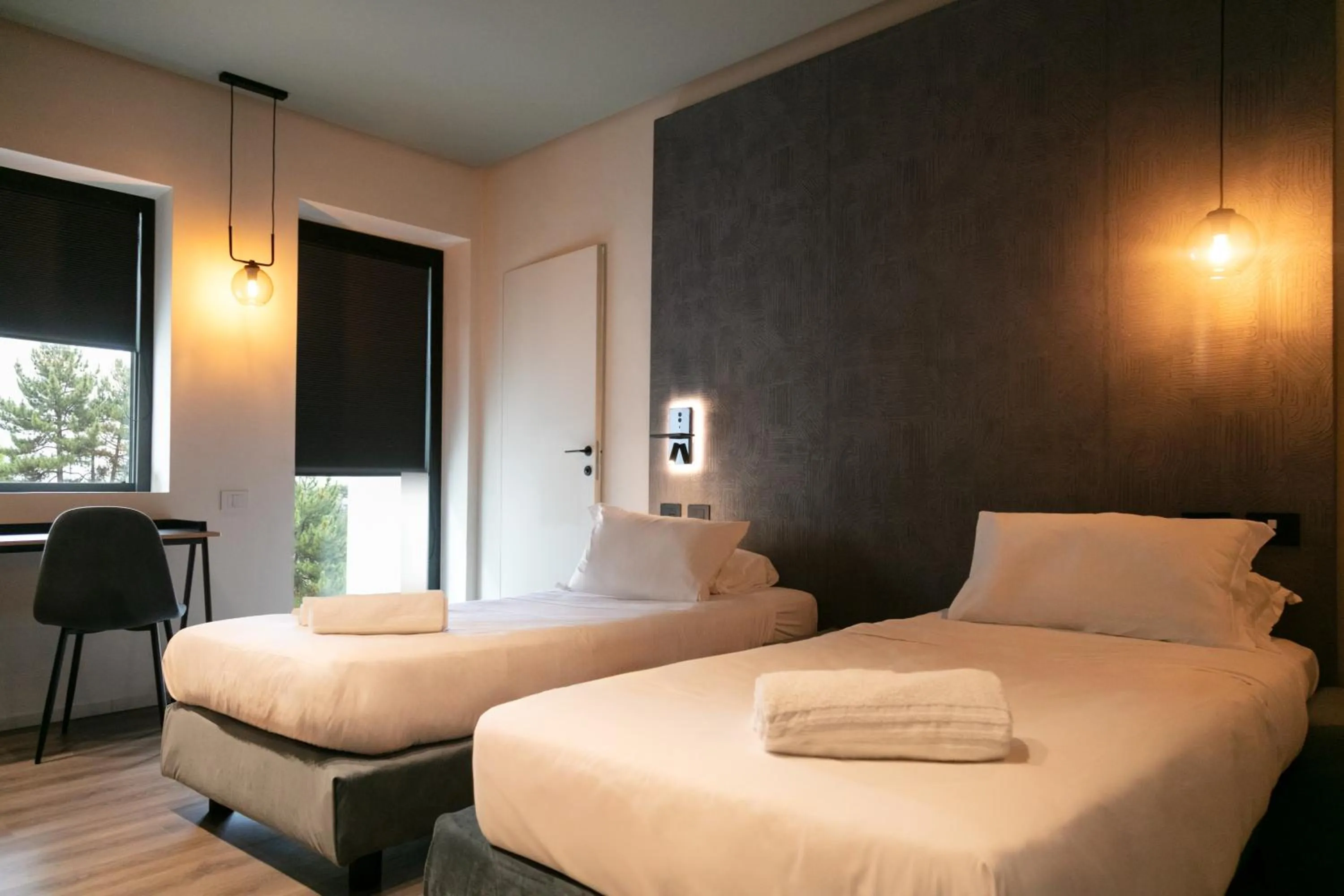 Bed in Michelangelo Etna Hotel