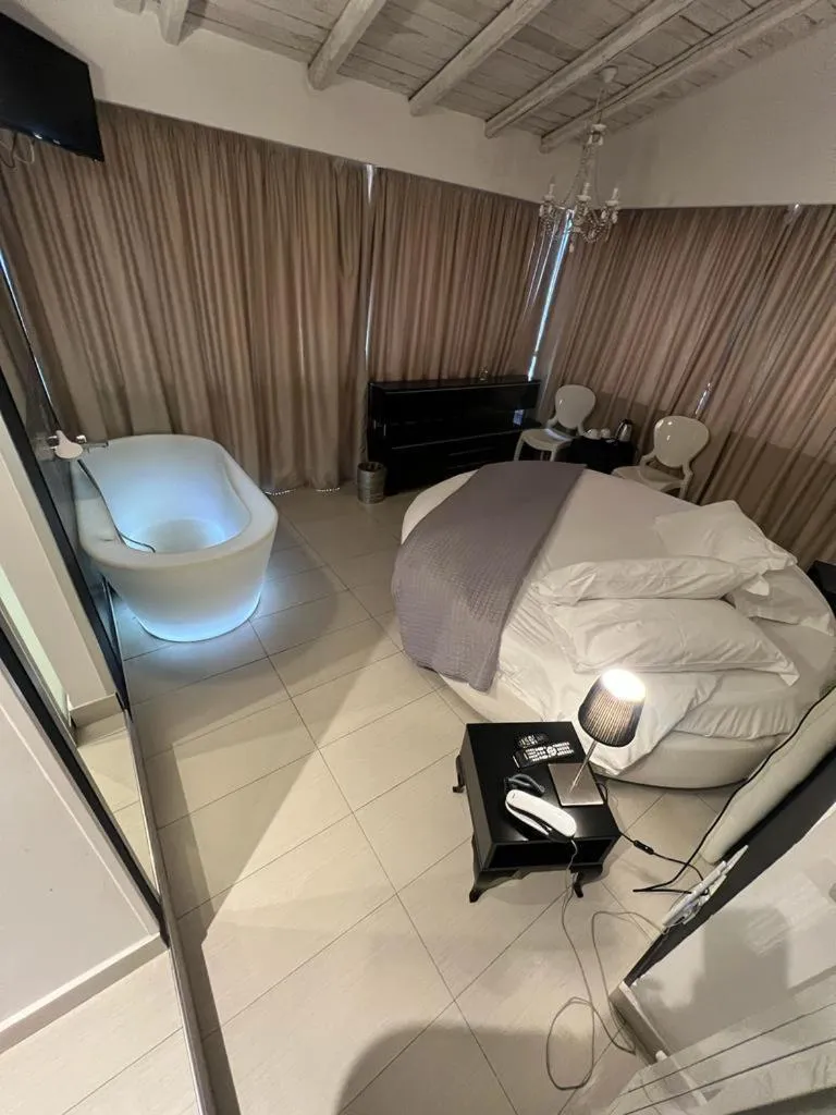 Bed in Michelangelo Etna Hotel