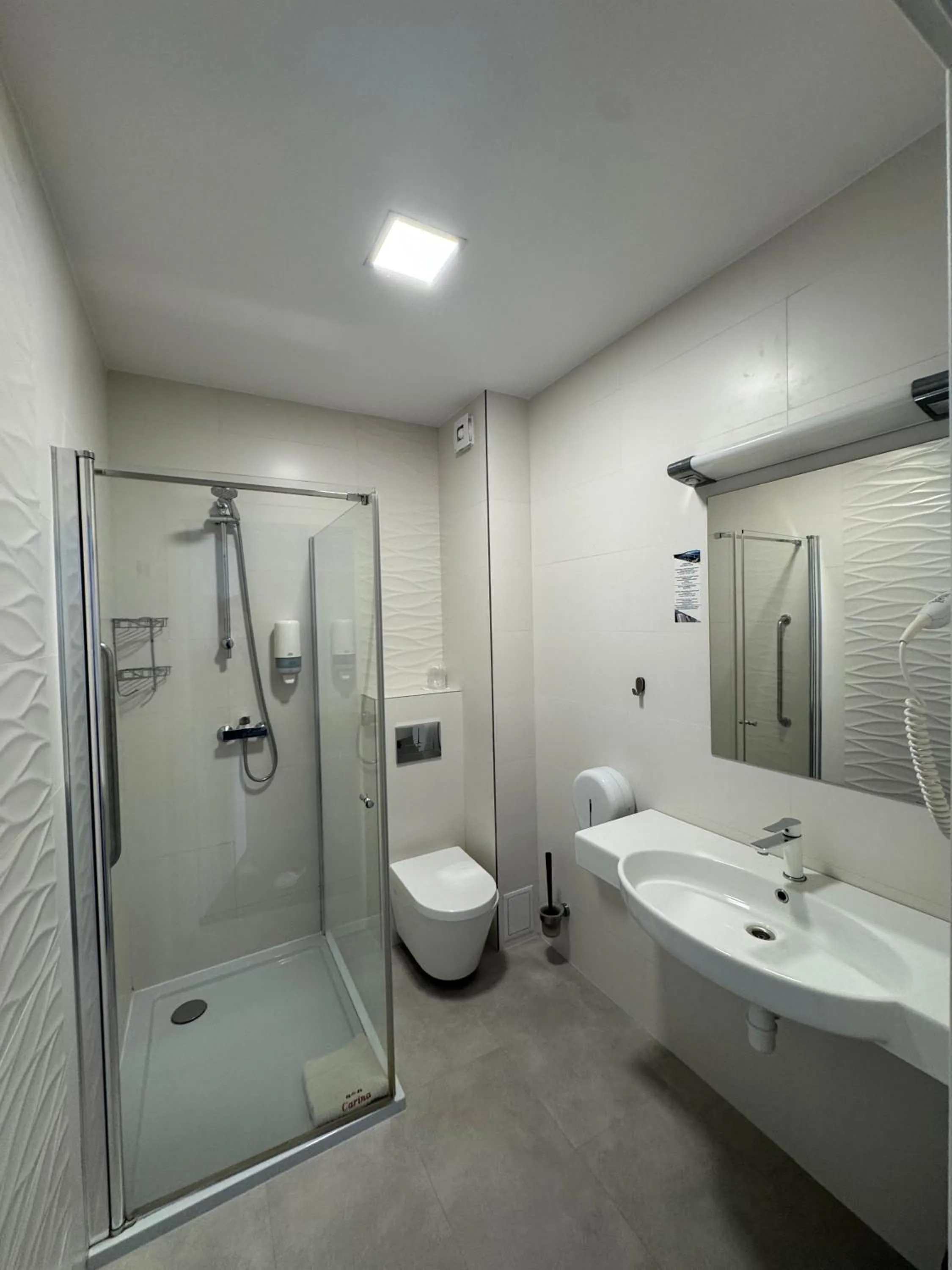 Shower in Carina Hotel