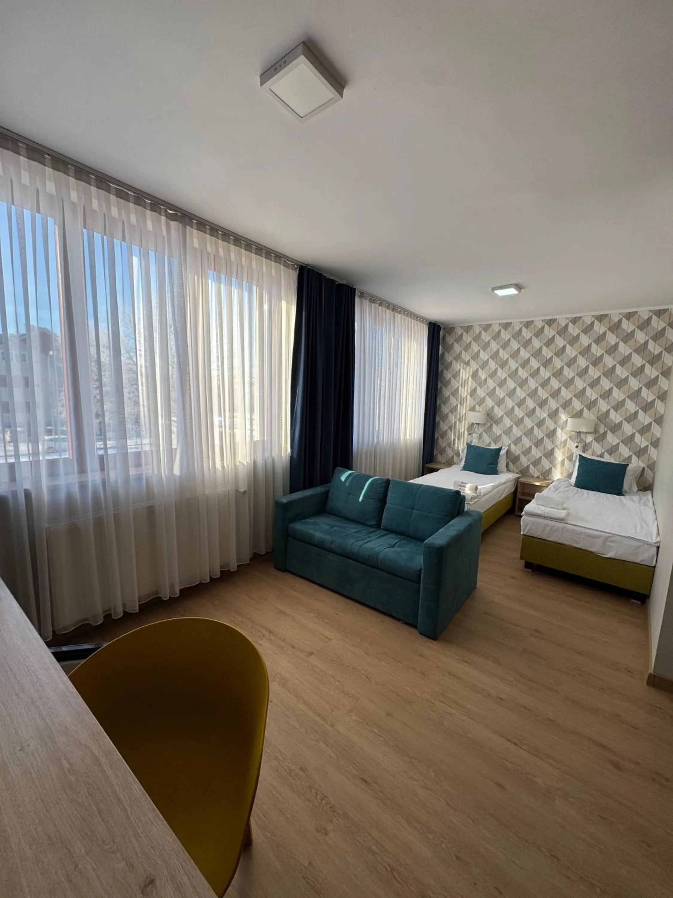 Photo of the whole room, Bed in Carina Hotel