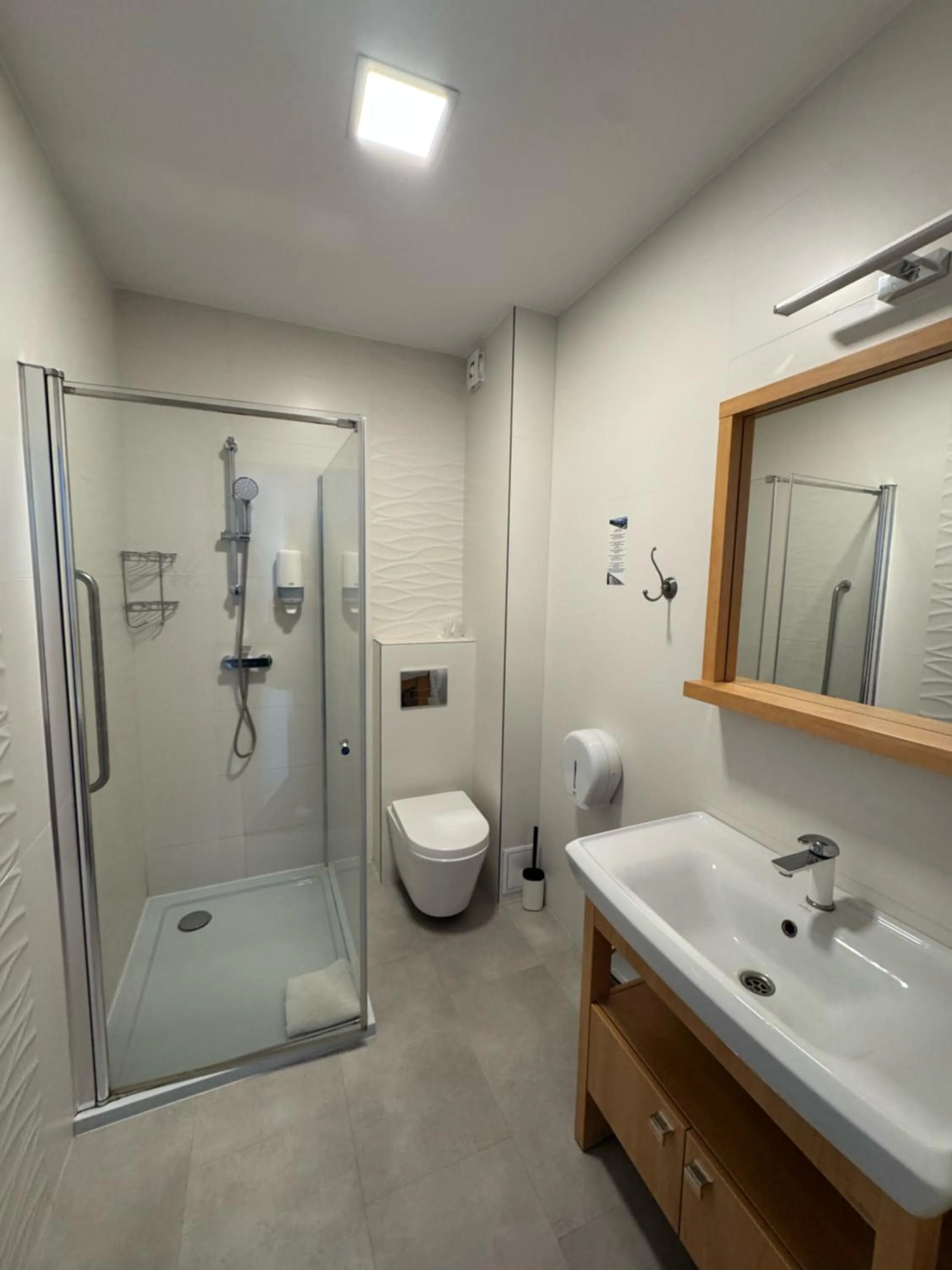 Bathroom in Carina Hotel