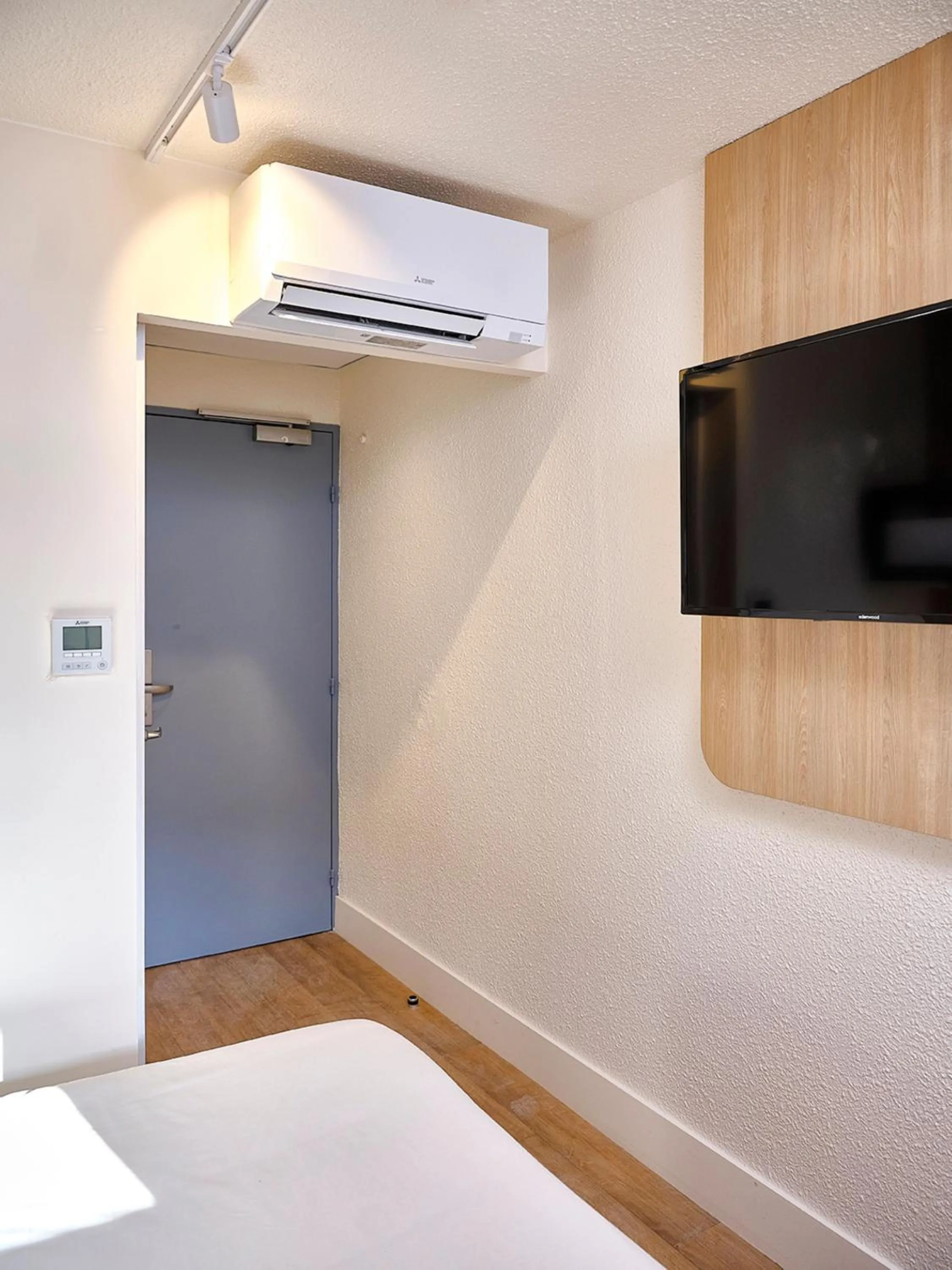 air conditioner, Bed in Premiere Classe Annecy Cran-Gevrier RÉNOVÉ EN 2025