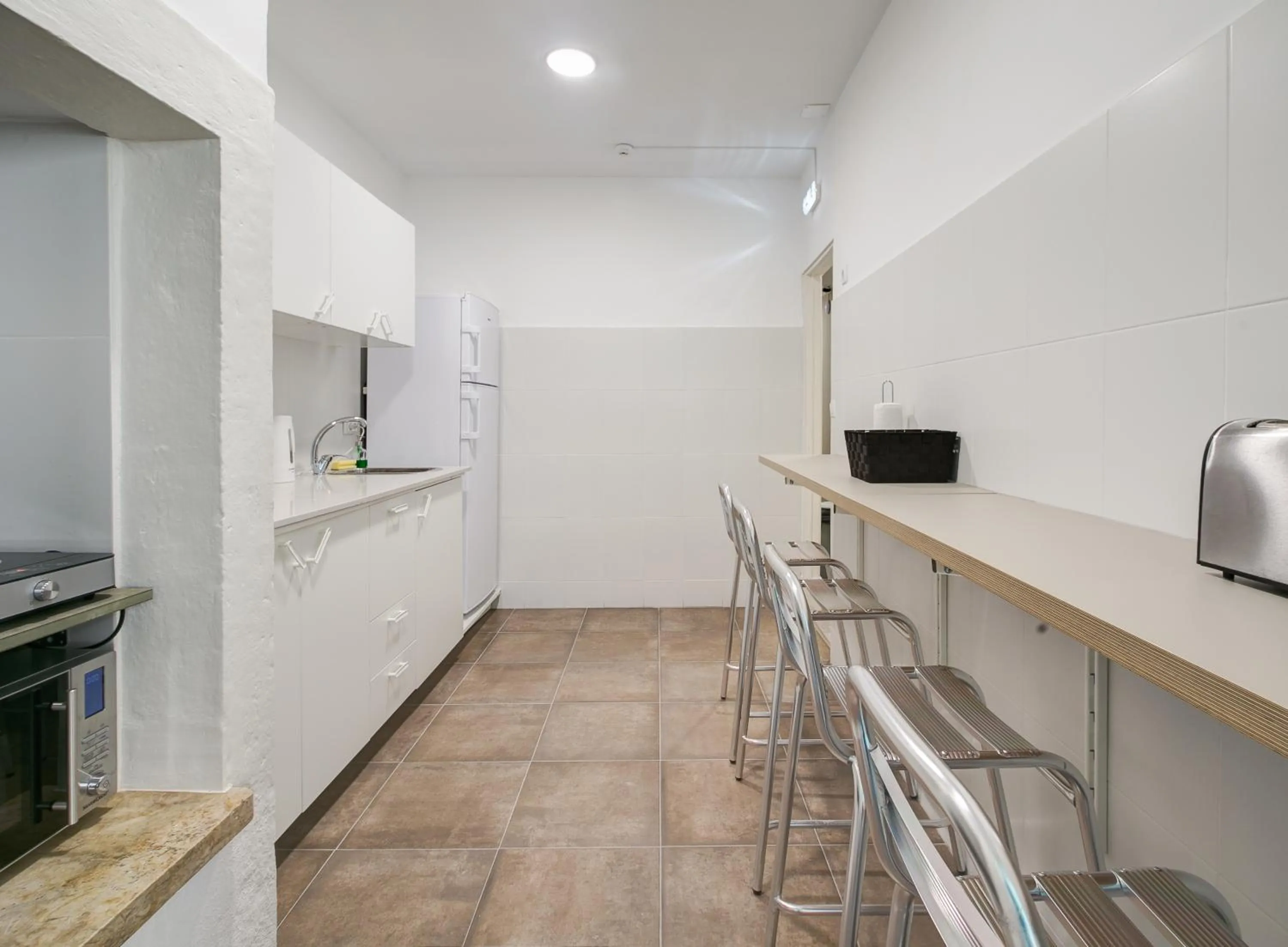 Communal kitchen in Hostel Seven Hills