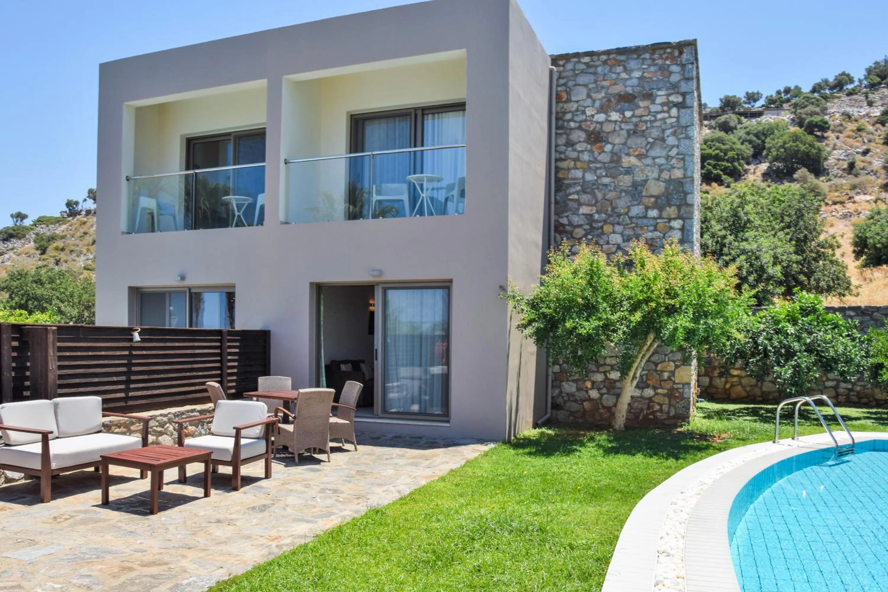 Patio, Swimming Pool in Royal Heights Resort Villas & Spa