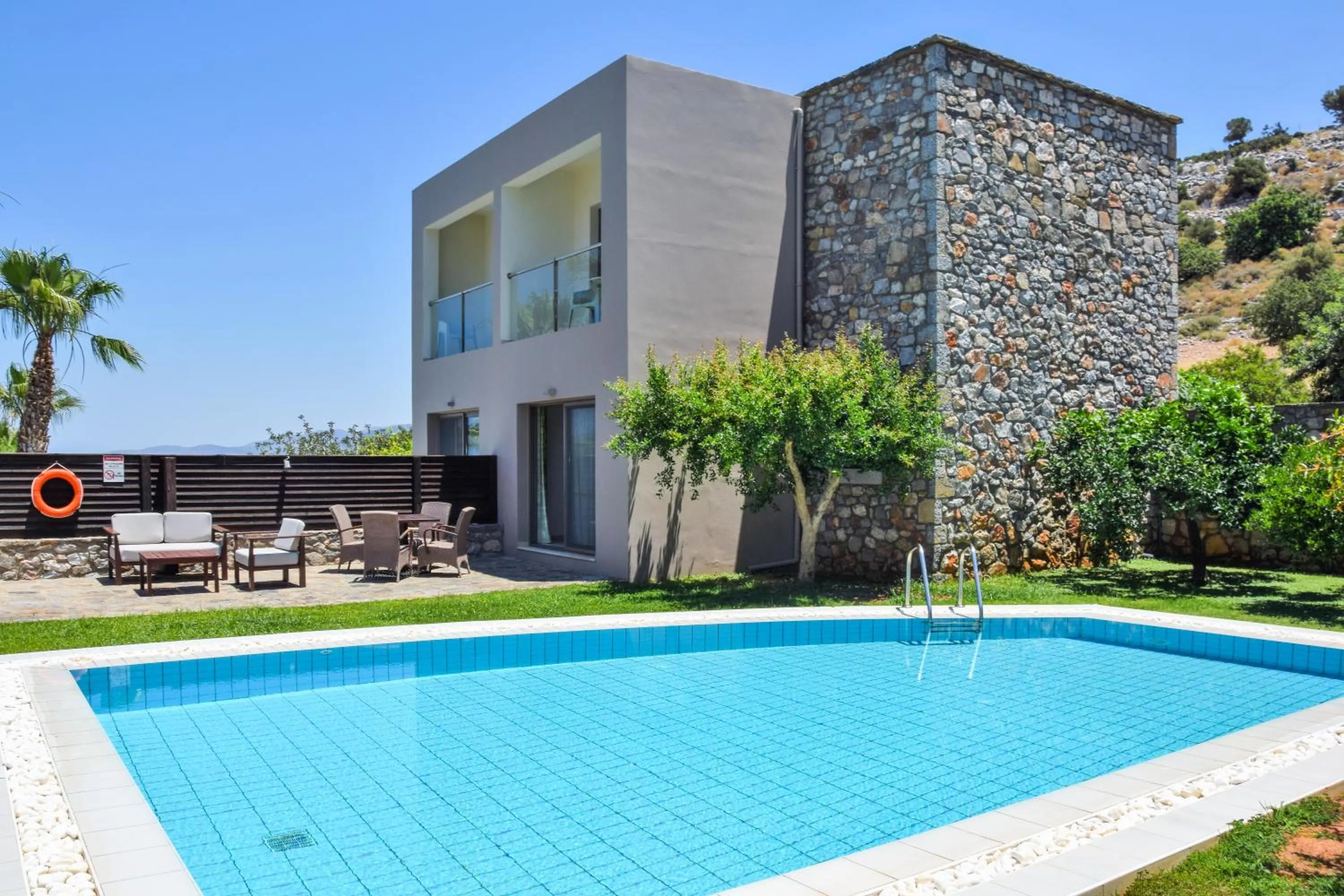 Patio, Swimming Pool in Royal Heights Resort Villas & Spa