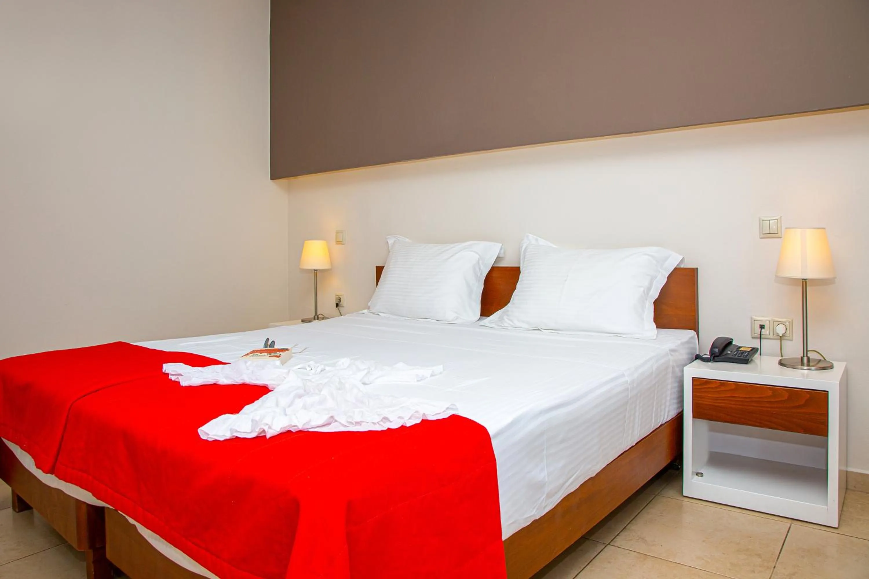 Bed in Royal Heights Resort Villas & Spa