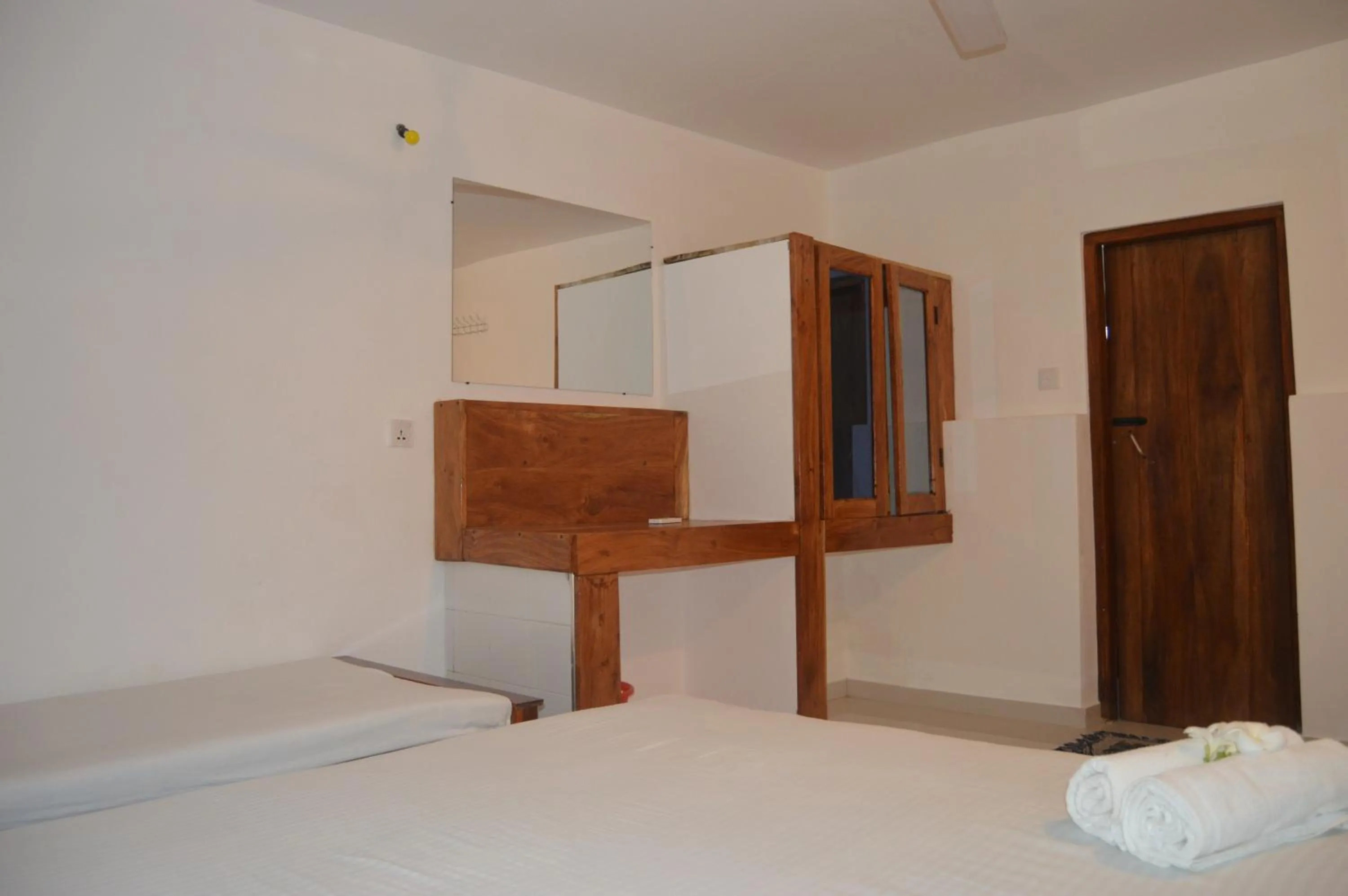 Bed in Shim Beach Resort