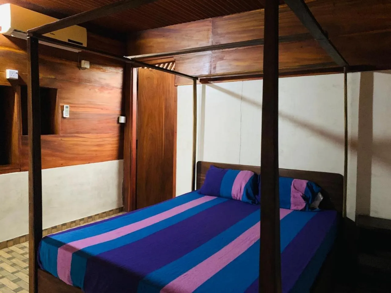 Bed in Shim Beach Resort