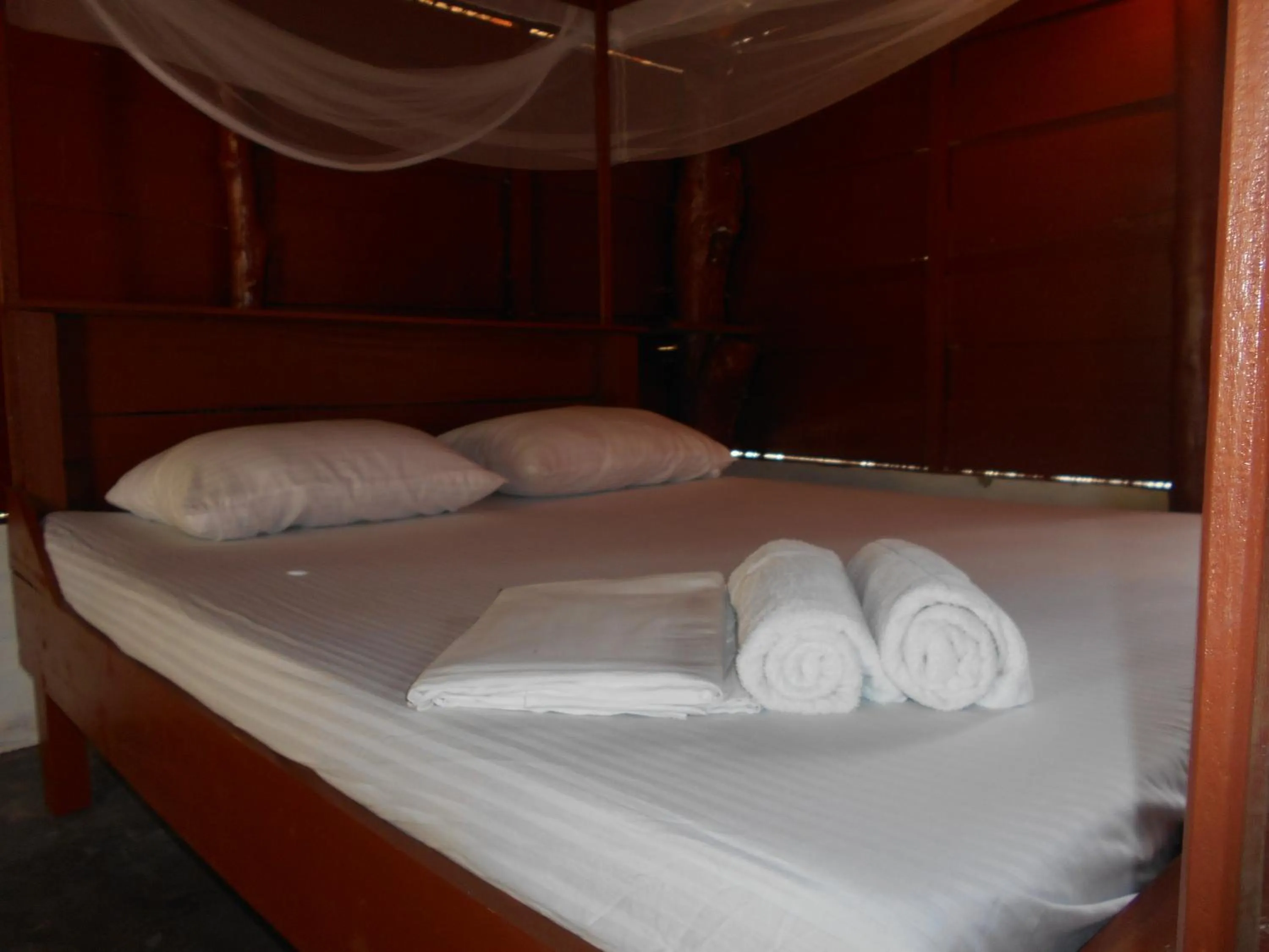 Bed in Shim Beach Resort