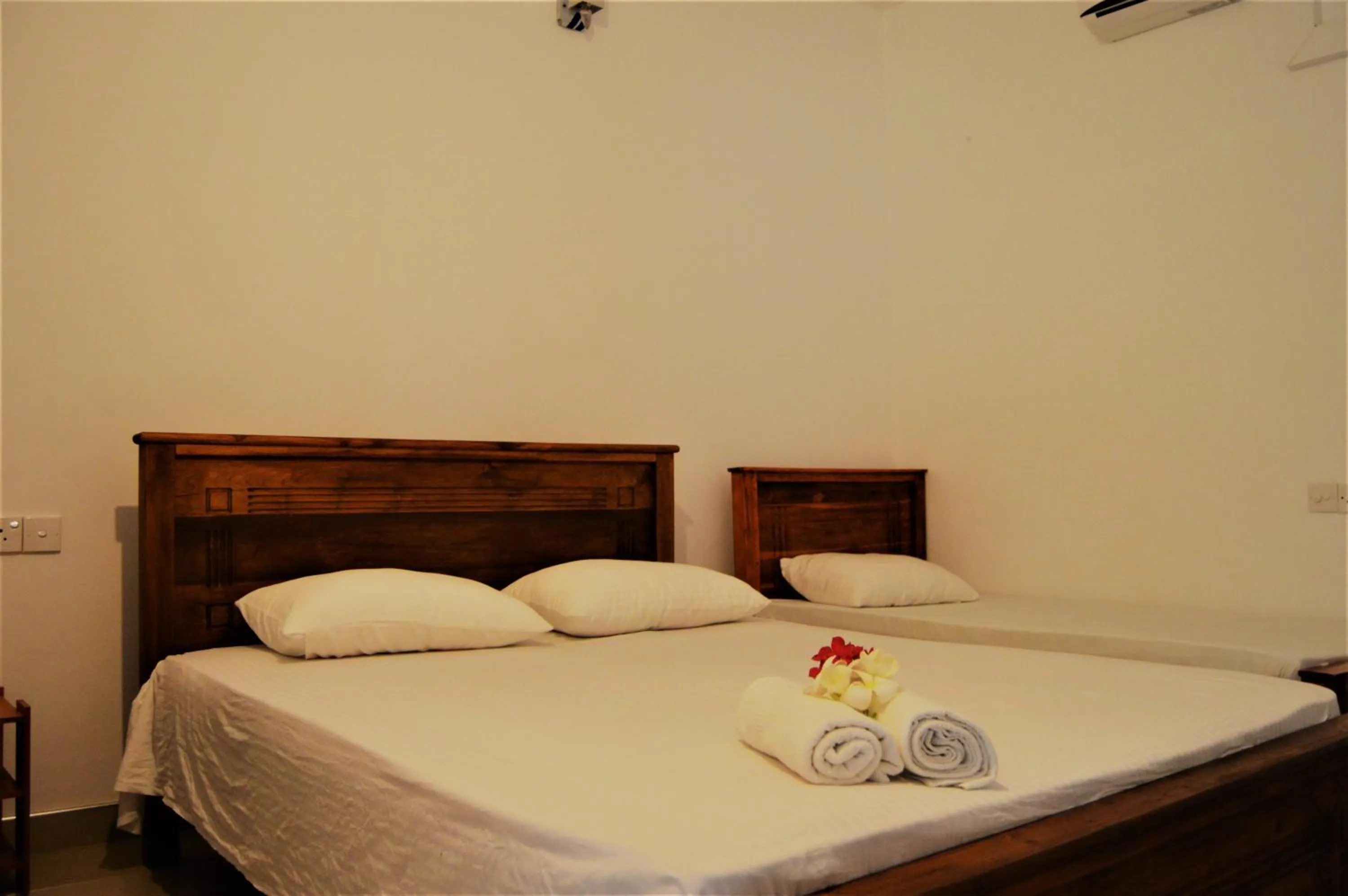 Bed in Shim Beach Resort