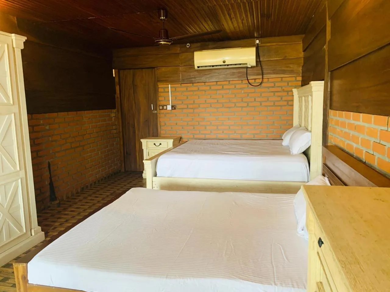 Bed in Shim Beach Resort