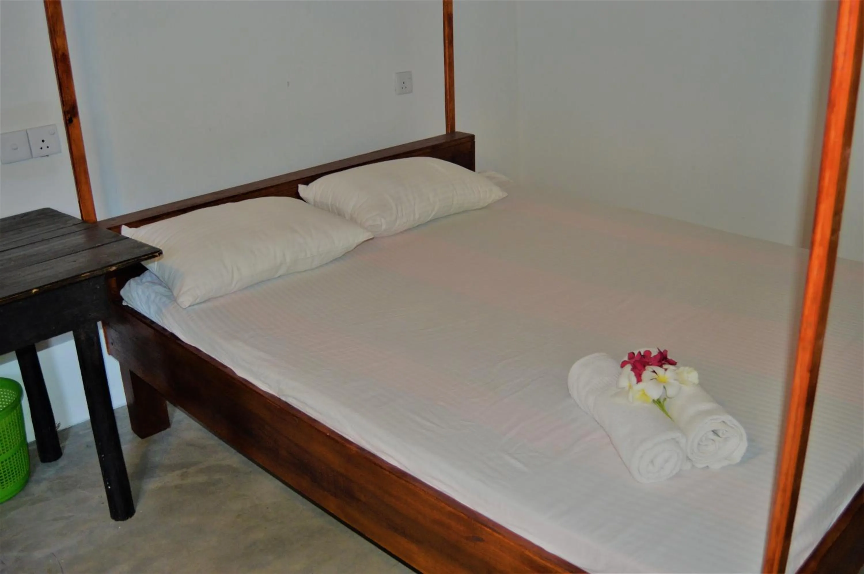 Bed in Shim Beach Resort