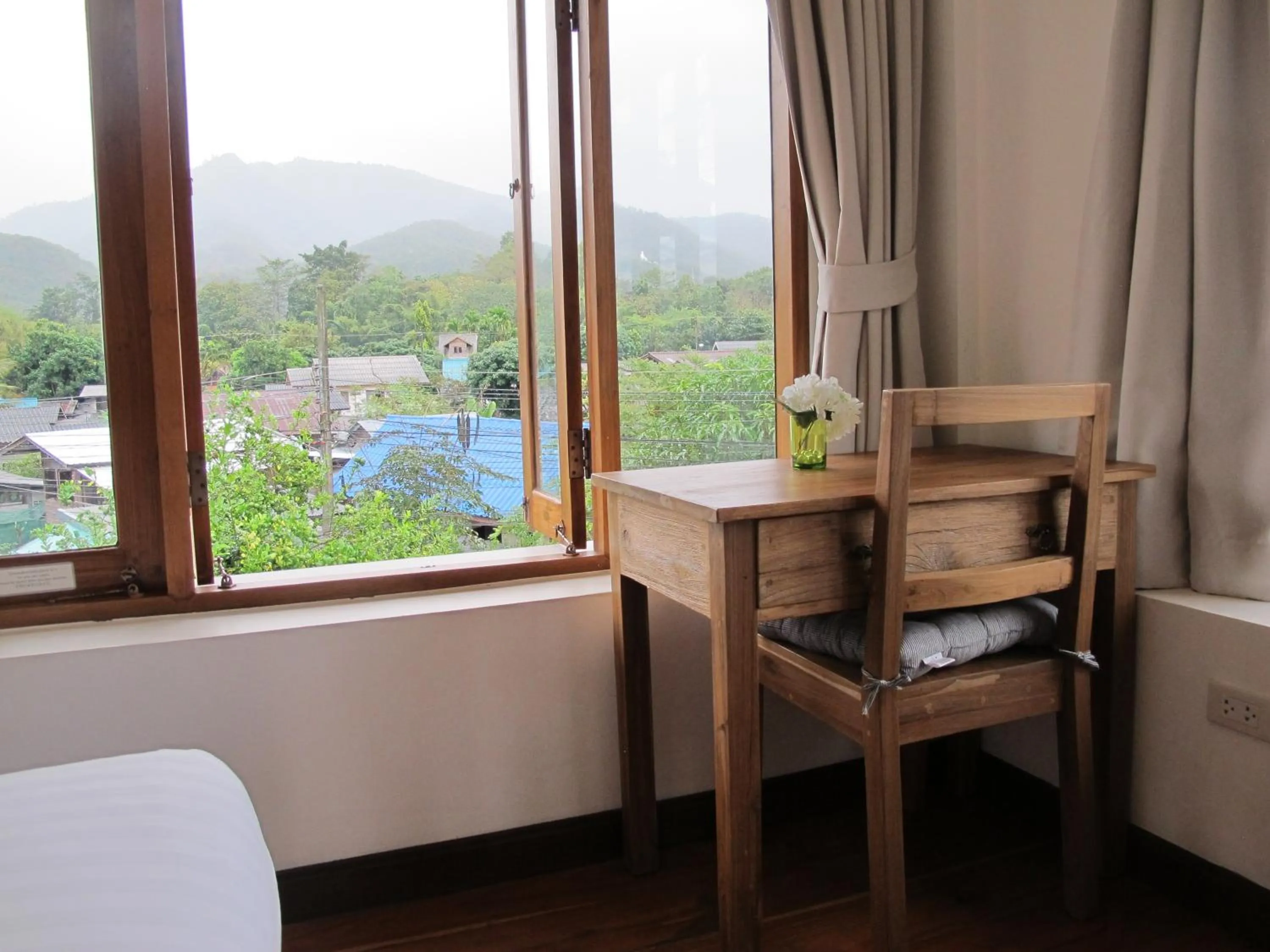 Seating area in Pai Cherkaew Boutique House