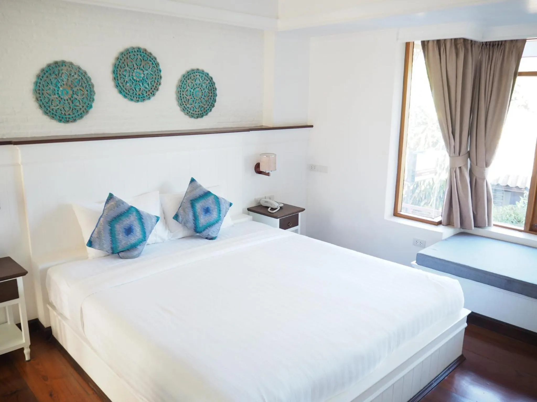 Decorative detail, Bed in Pai Cherkaew Boutique House