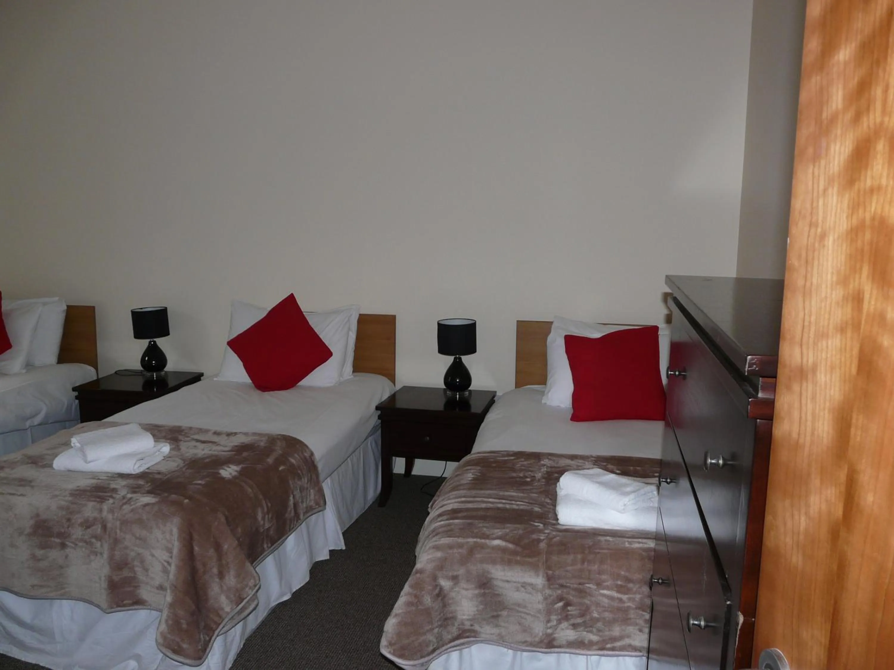 Bed in The Courtyard Apartments