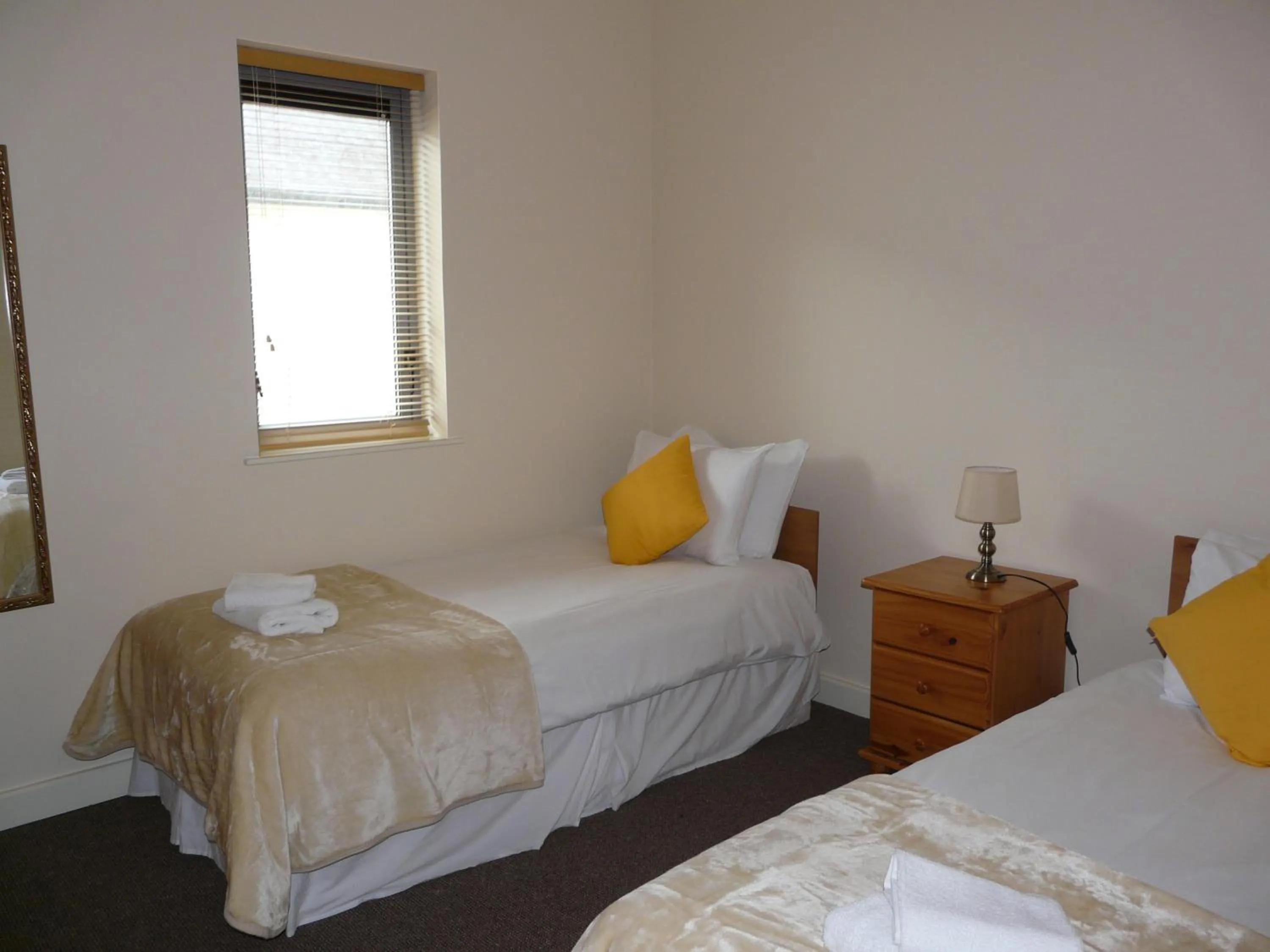 Bed in The Courtyard Apartments