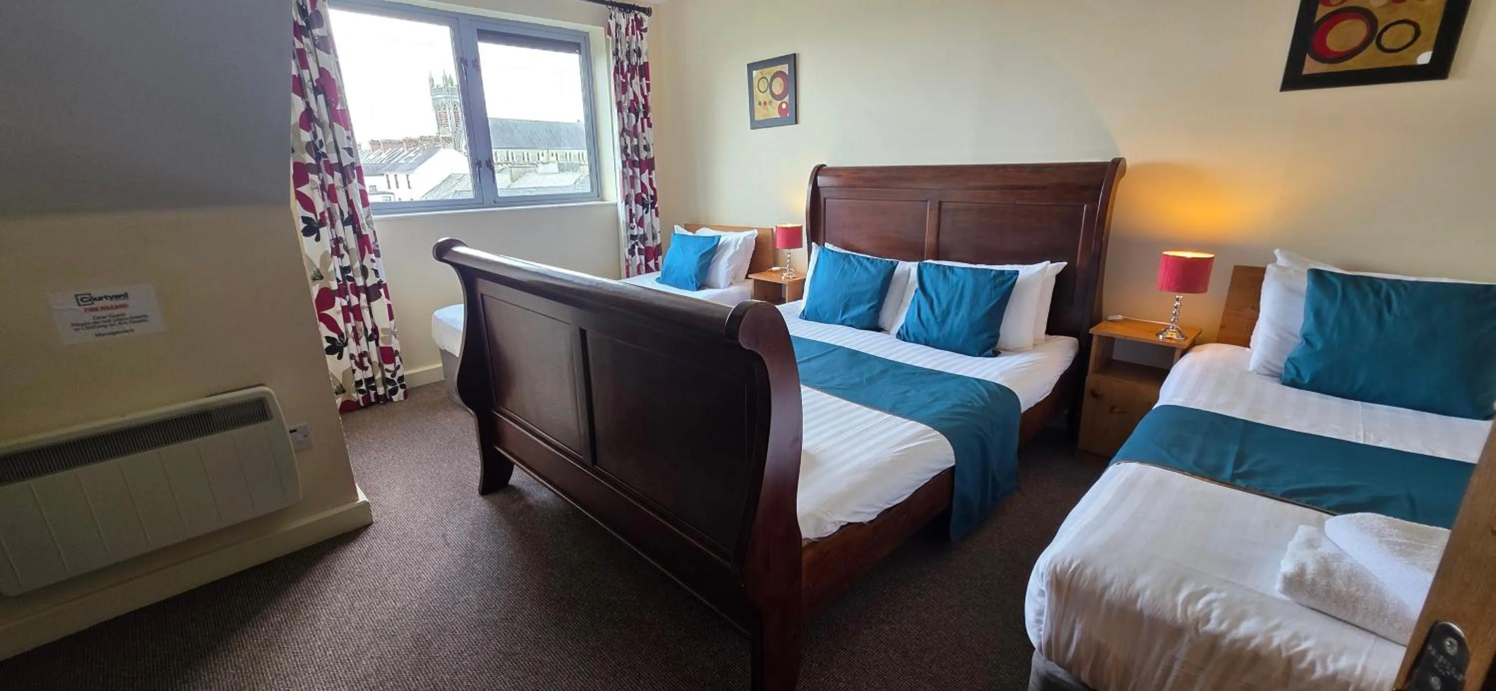 Bed in The Courtyard Apartments