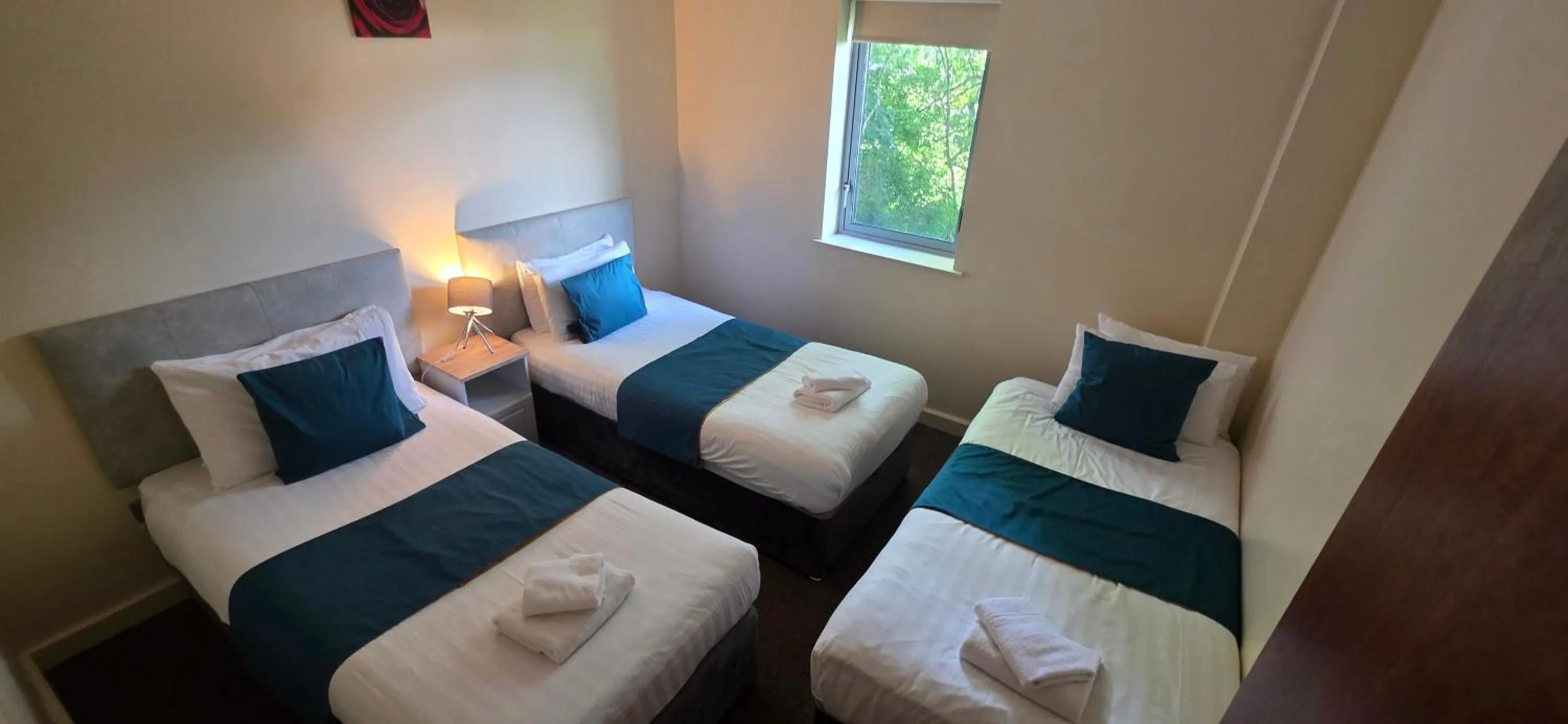 Bed in The Courtyard Apartments