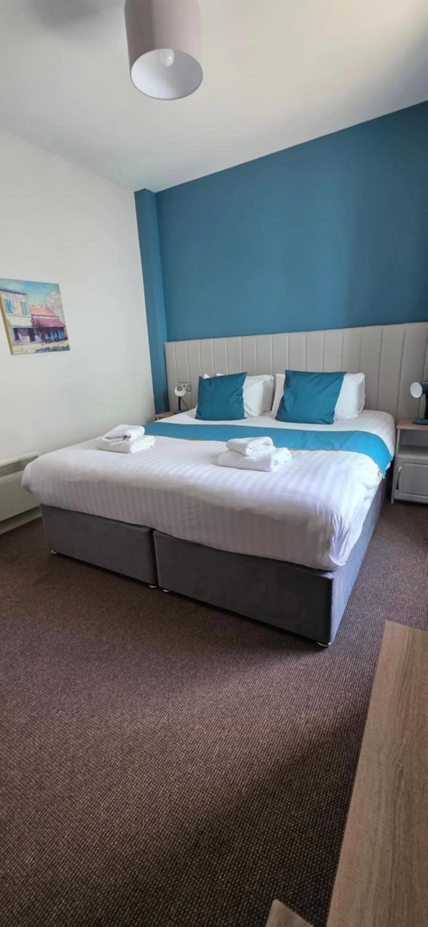 Bed in The Courtyard Apartments