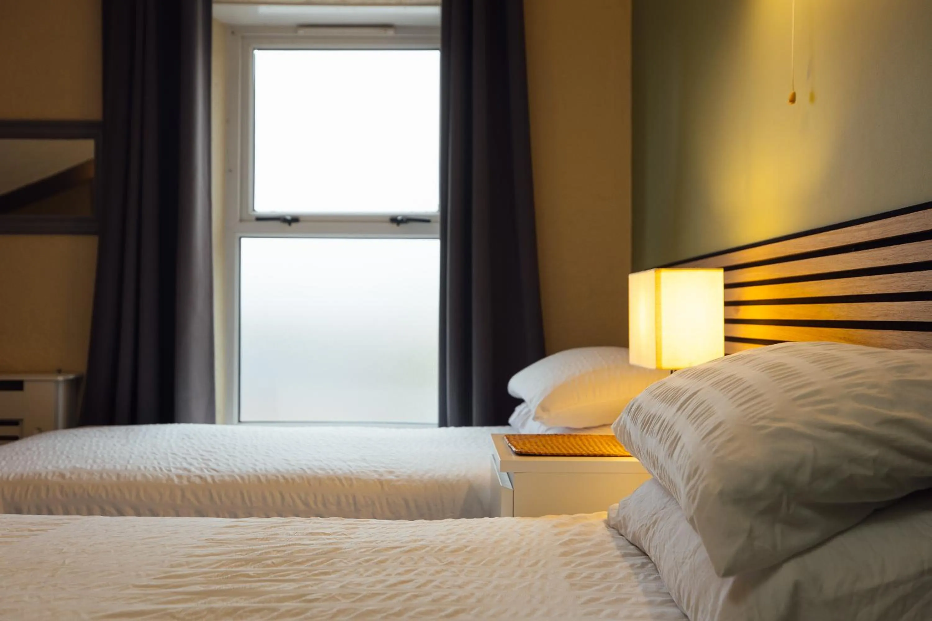 Bed in The Dolphin Hotel & Restaurant