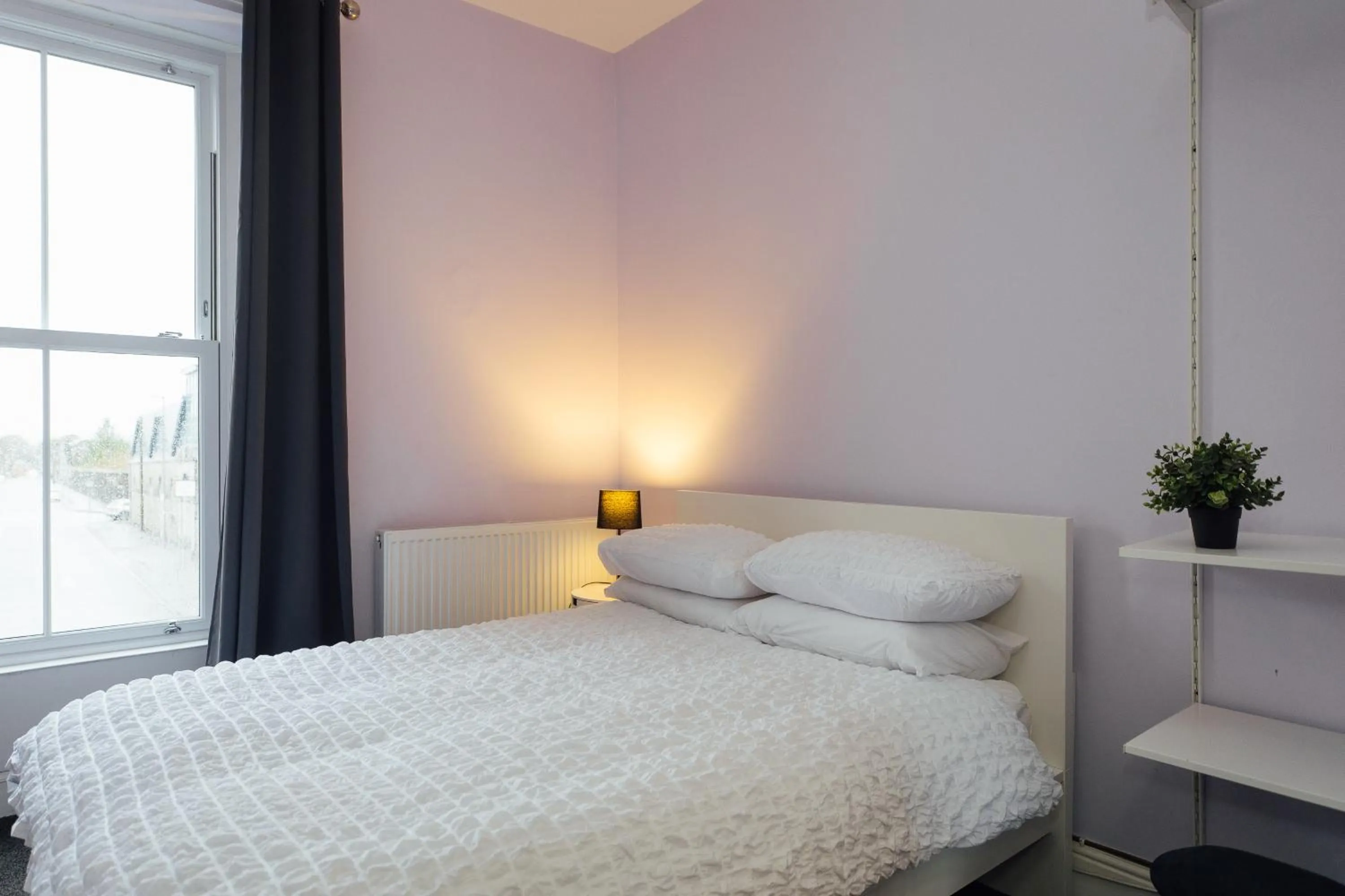 Bed in The Dolphin Hotel & Restaurant