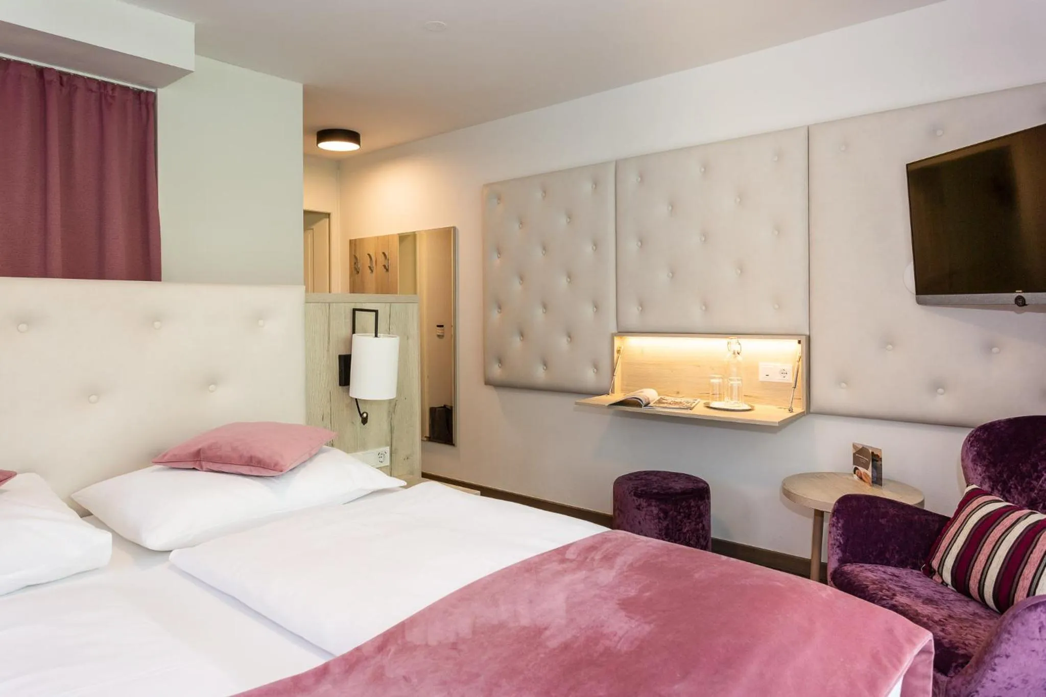 Photo of the whole room, Bed in Boutiquehotel Bergvilla