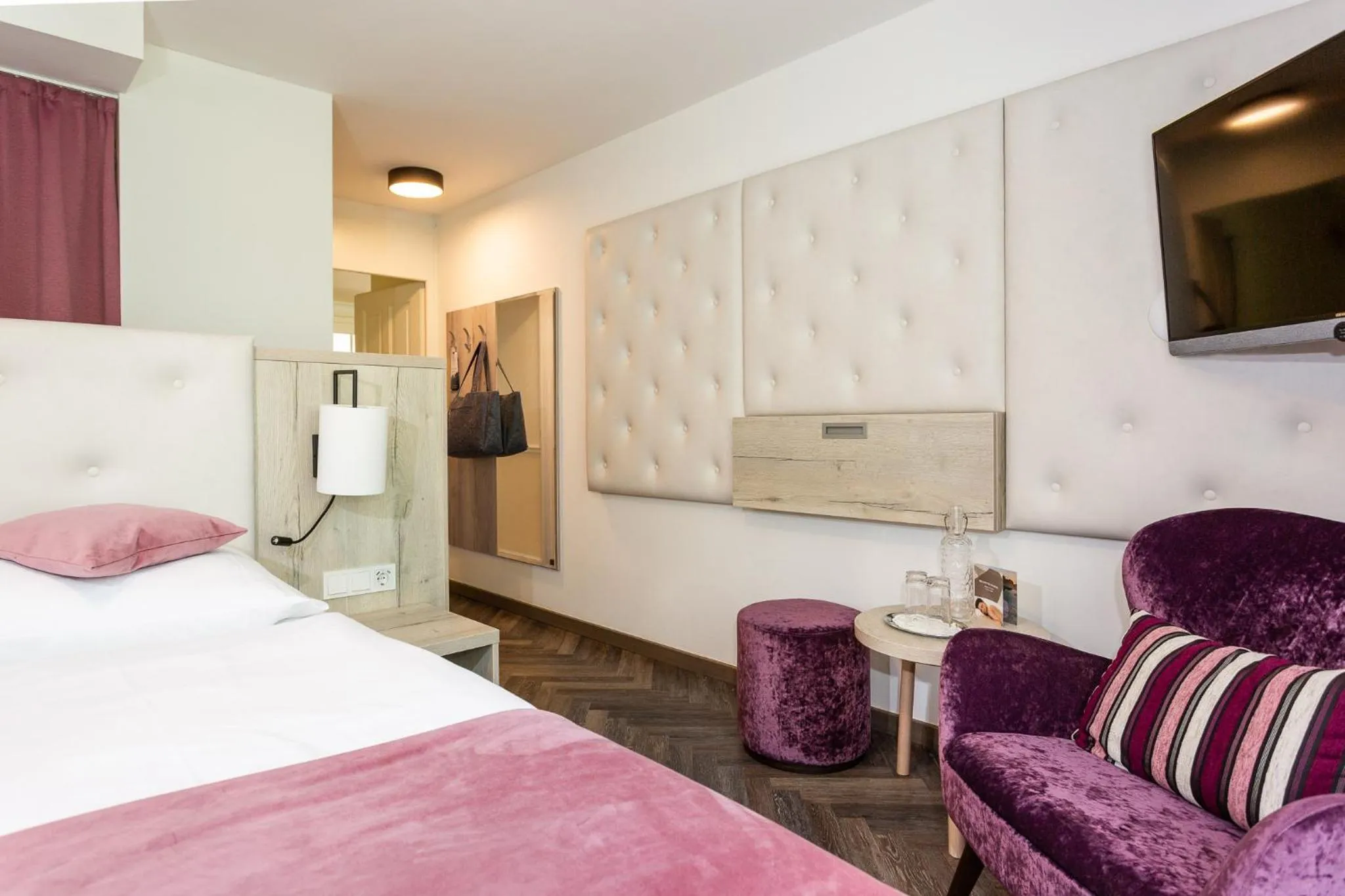 Photo of the whole room, Bed in Boutiquehotel Bergvilla