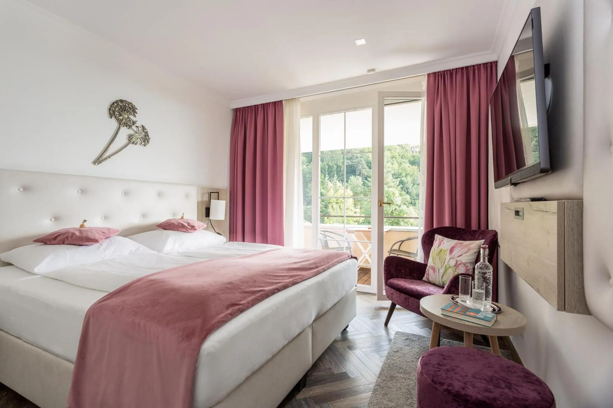 Photo of the whole room, Bed in Boutiquehotel Bergvilla