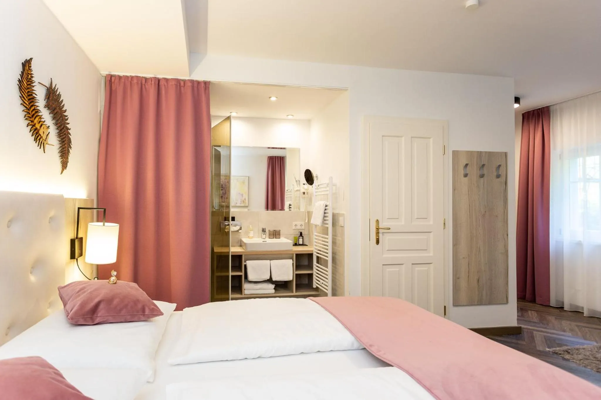 Photo of the whole room, Bed in Boutiquehotel Bergvilla