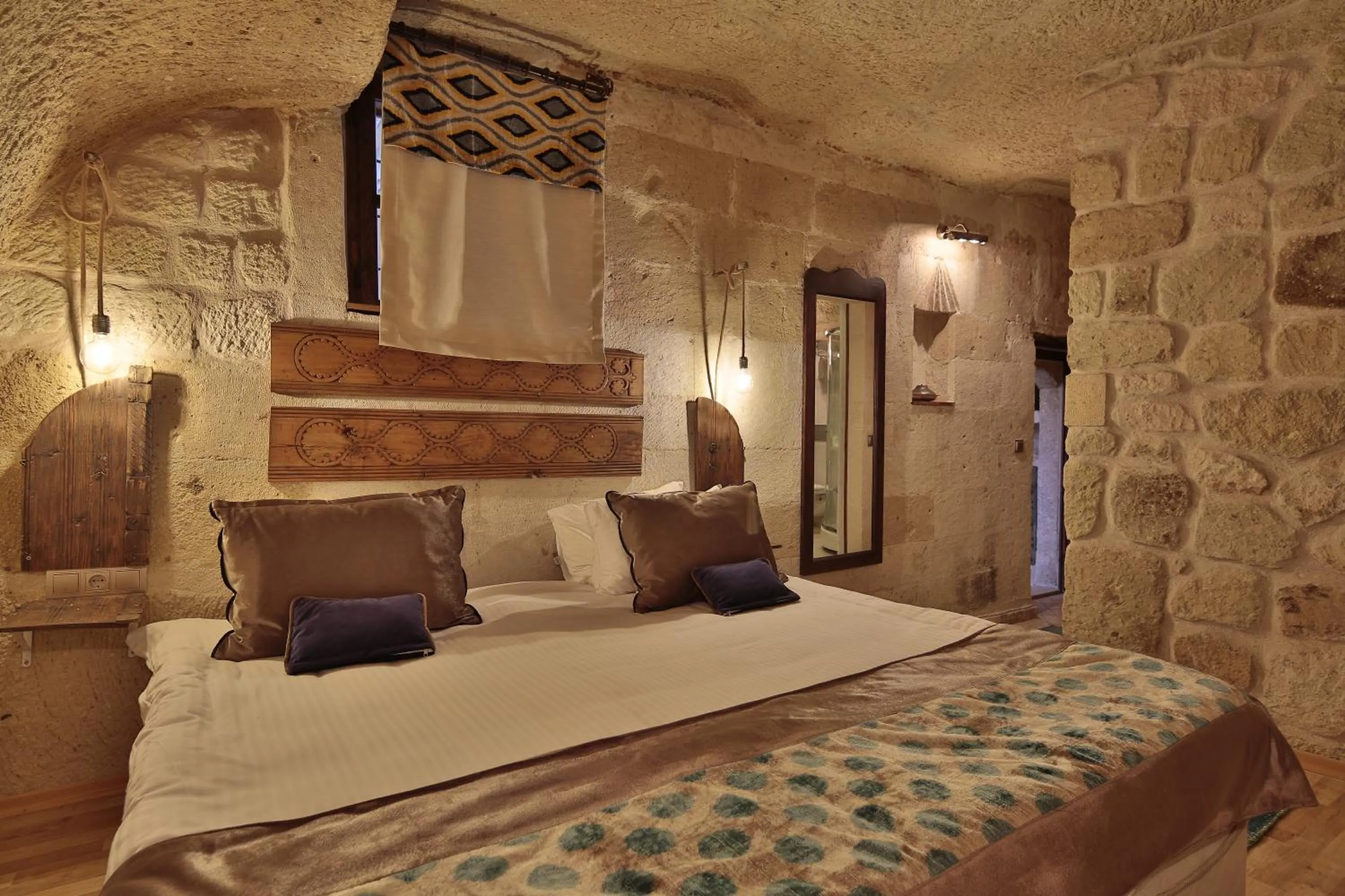 Bed in Elaa Cave Hotel