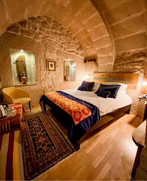 Bed in Elaa Cave Hotel