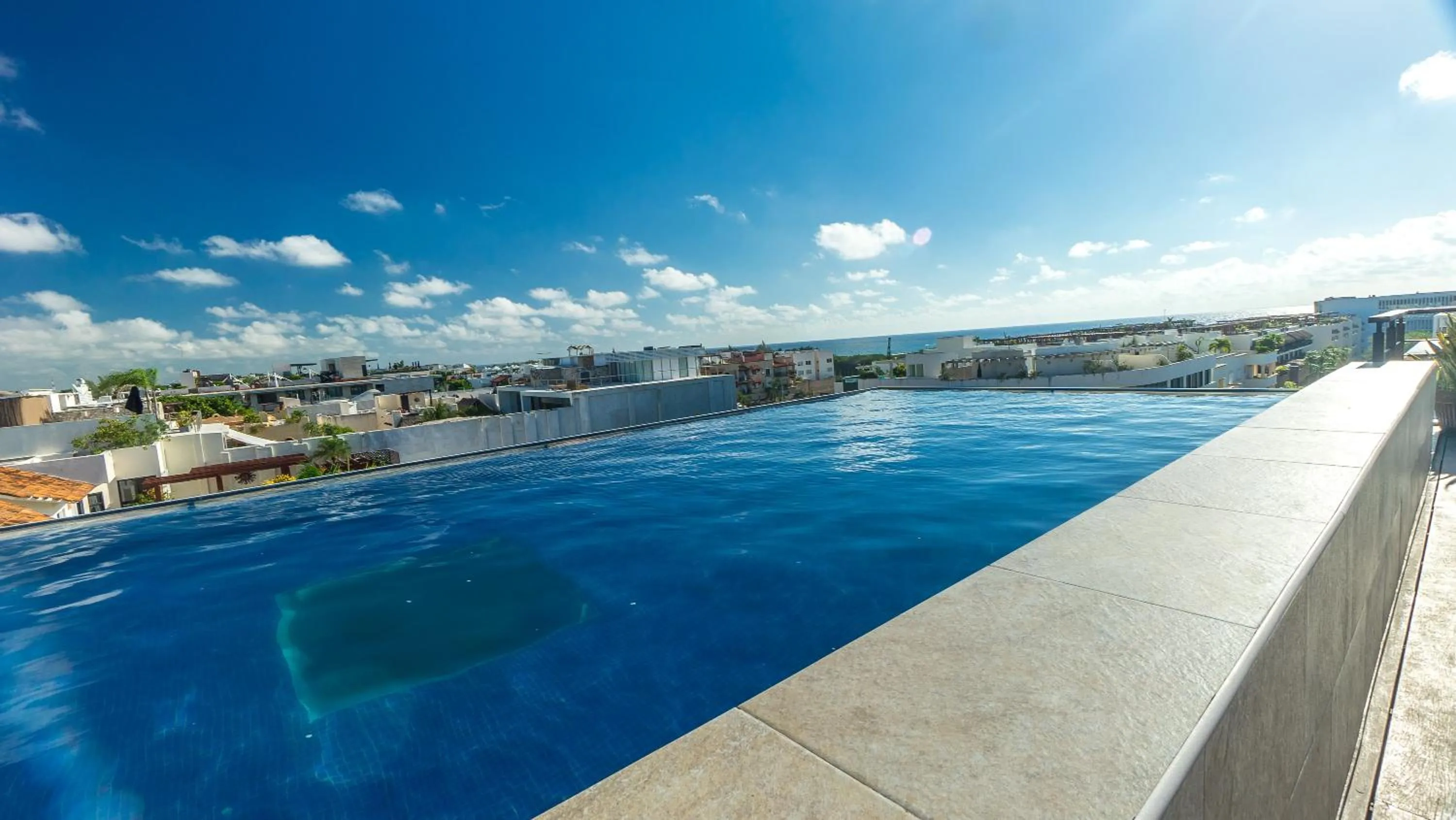 Swimming pool in Lotus Midtown Apartments by BVR