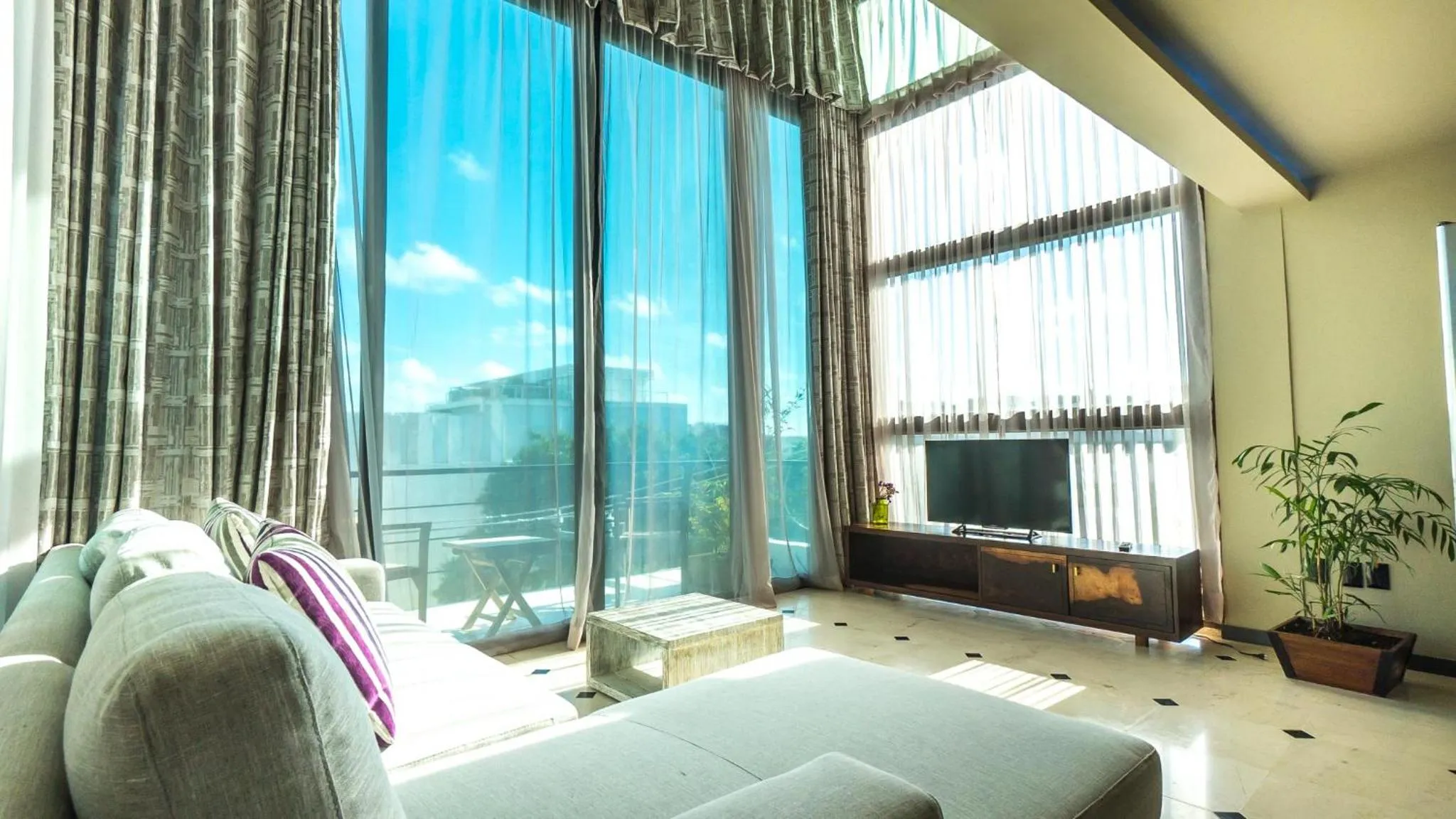 TV and multimedia in Lotus Midtown Apartments by BVR