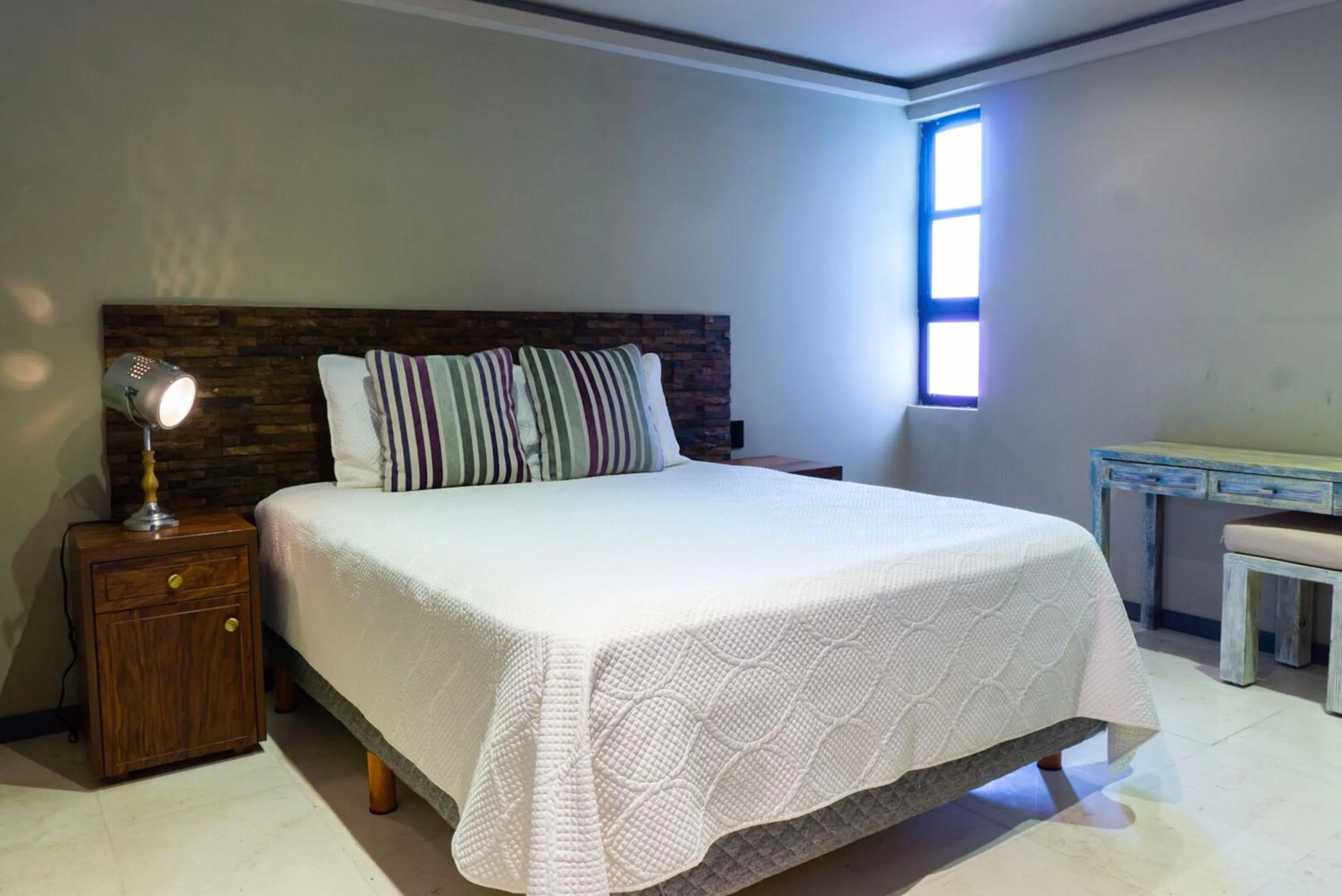 Bed in Lotus Midtown Apartments by BVR