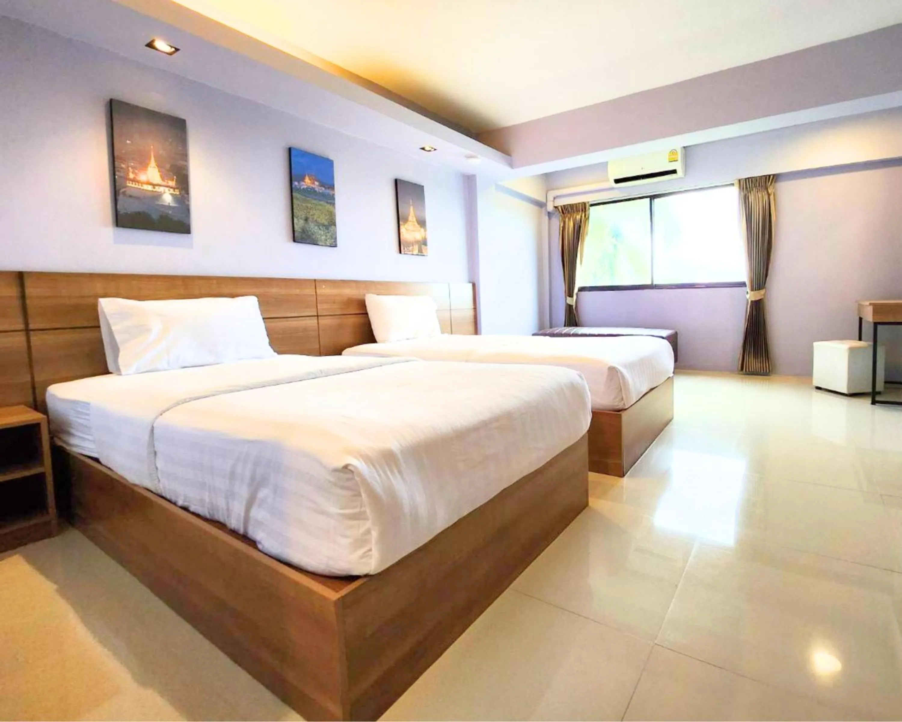 Bed in AIRBEST Gemtree Lampang Hotel