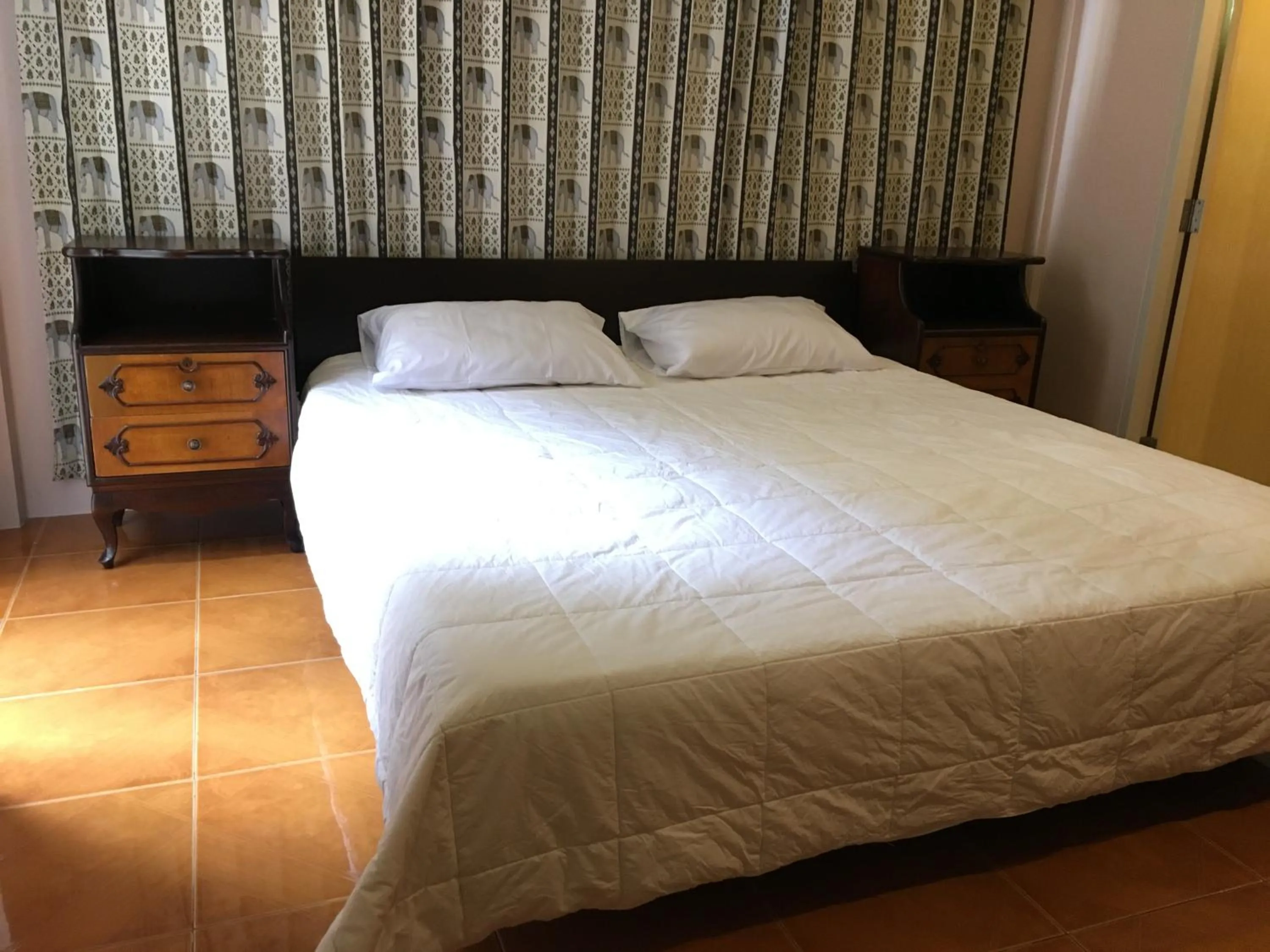 Photo of the whole room, Bed in The Grand Palace Hotel