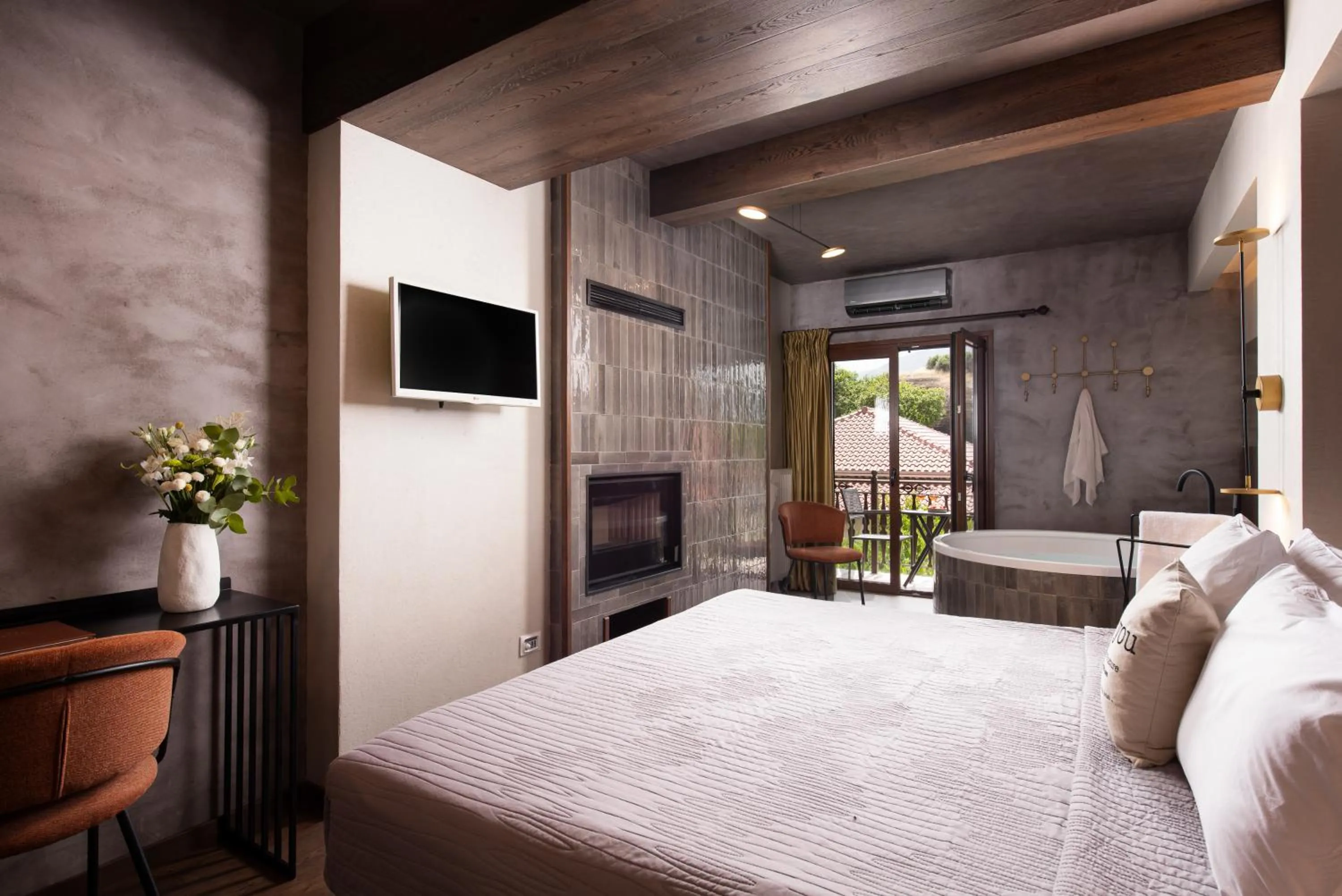 Bed in Tsikeli Boutique Hotel Meteora - Adults Friendly