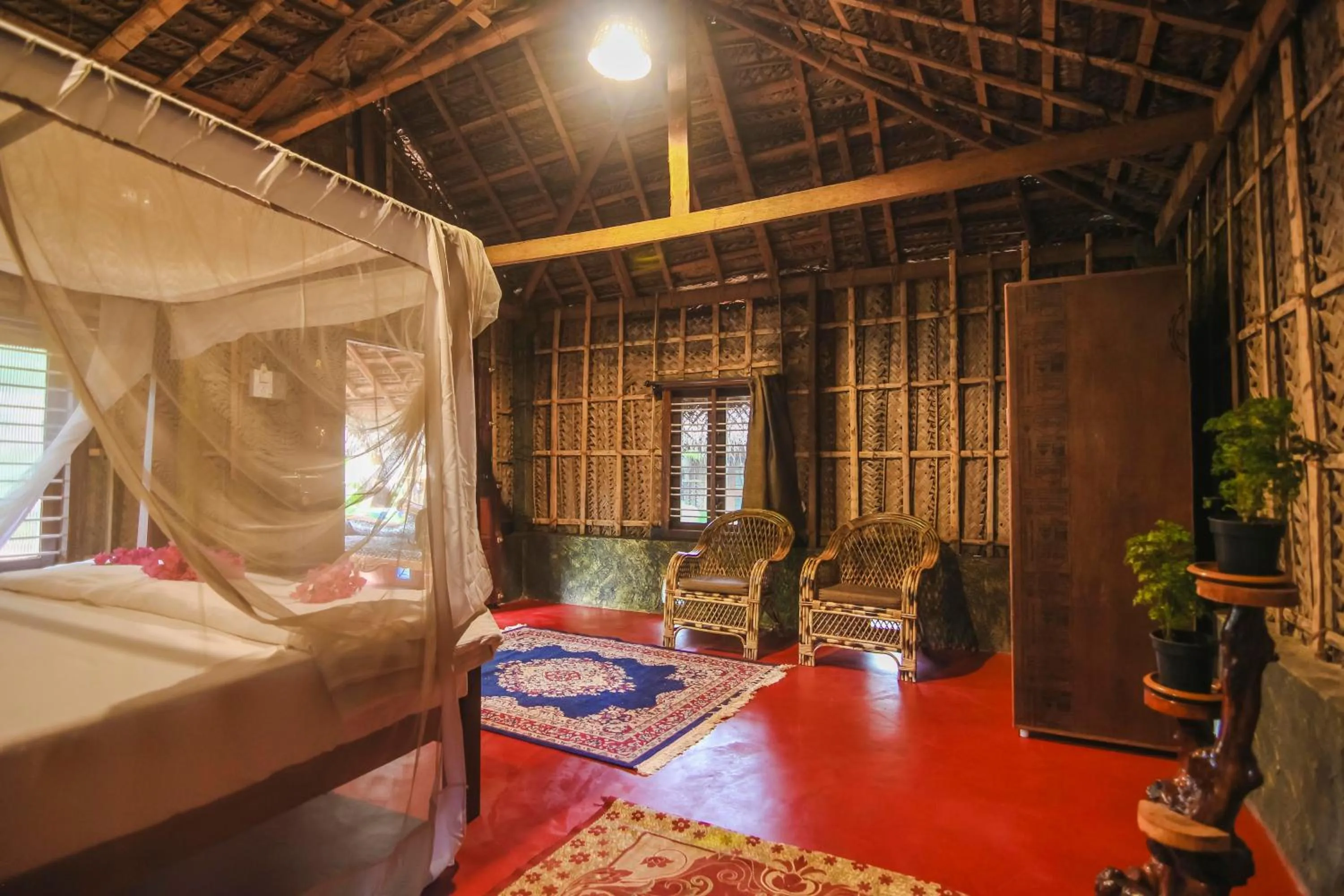 Photo of the whole room, Bed in Palm Trees Ayurvedic Heritage