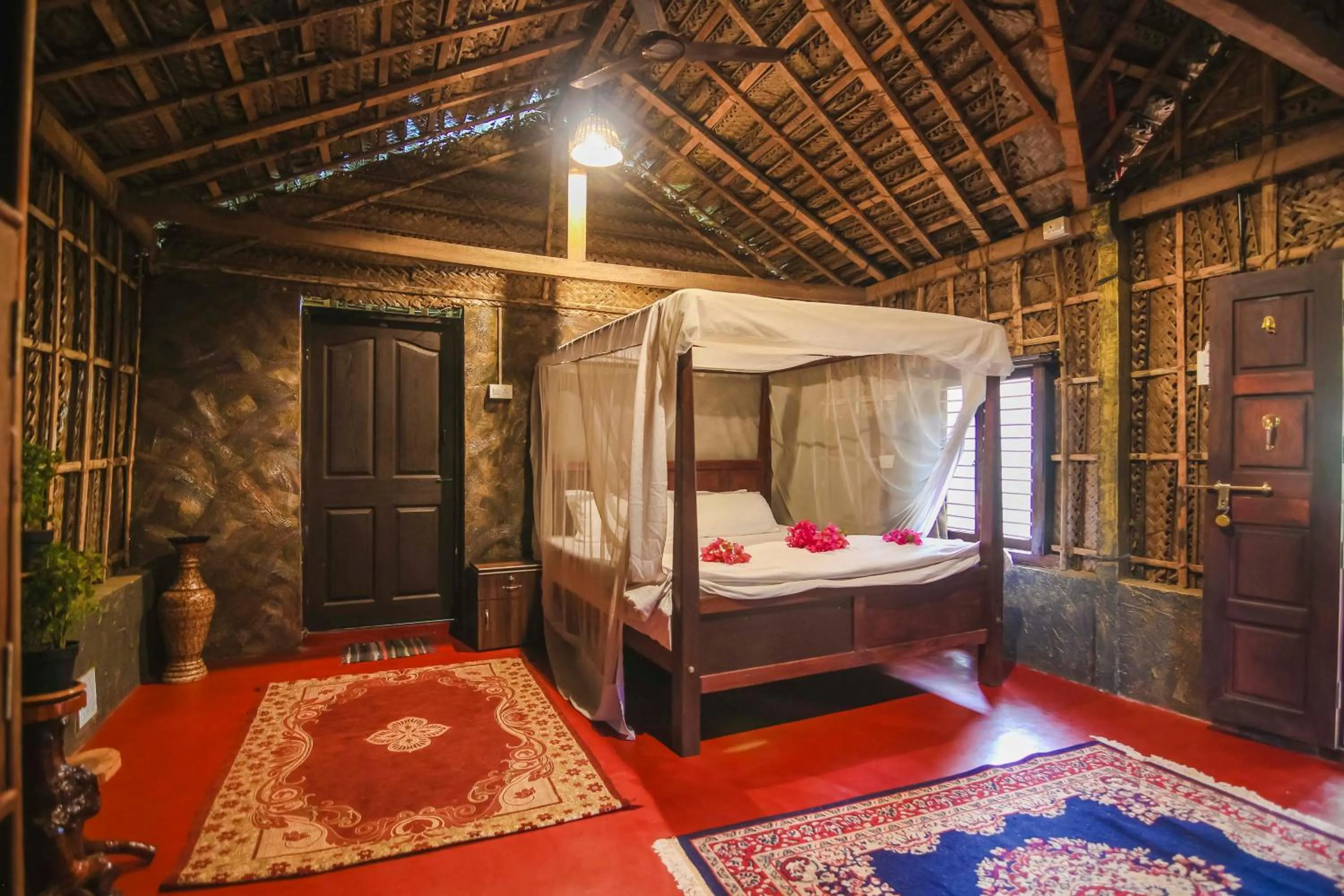 Photo of the whole room, Bed in Palm Trees Ayurvedic Heritage