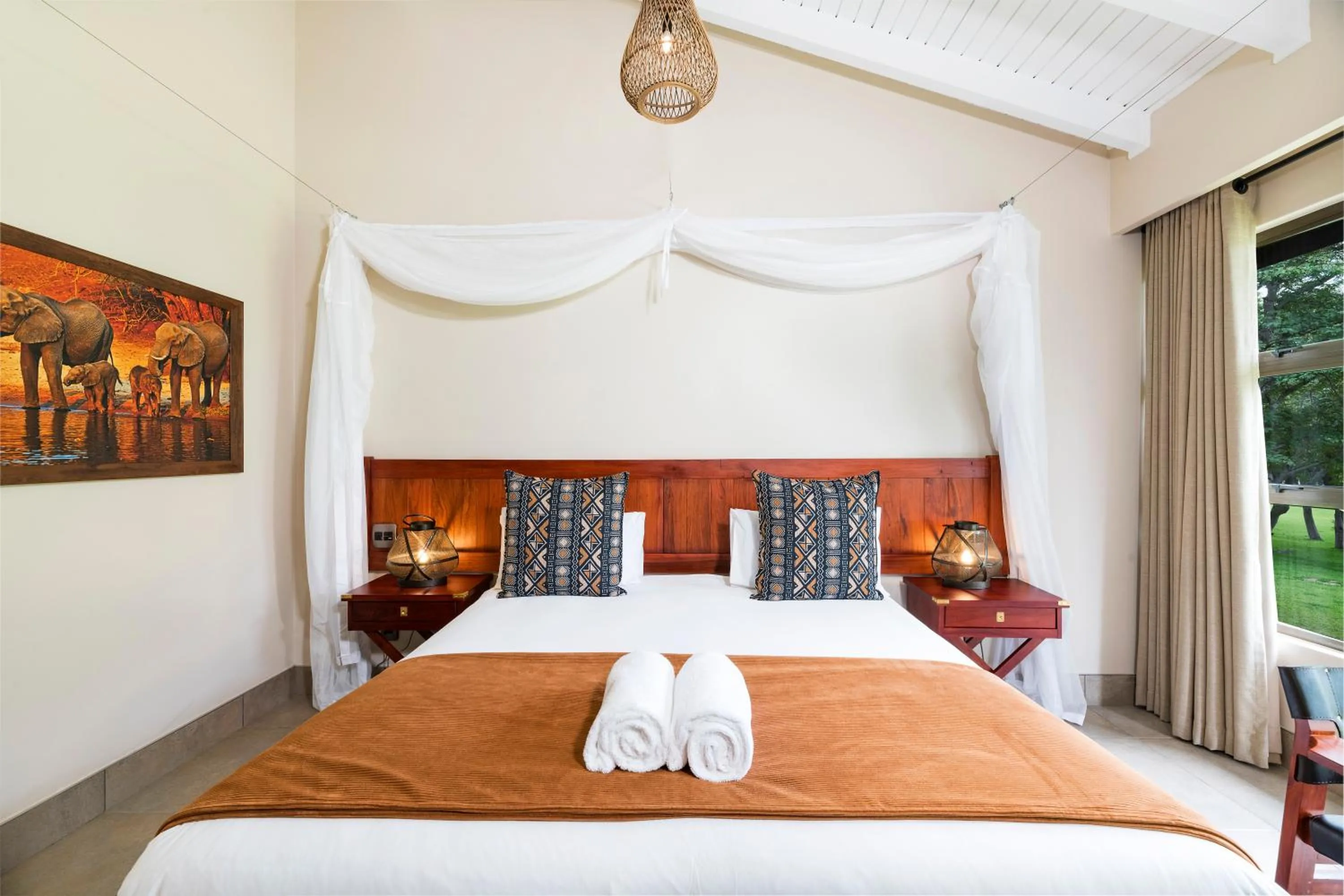 Bed in Hwange Safari Lodge