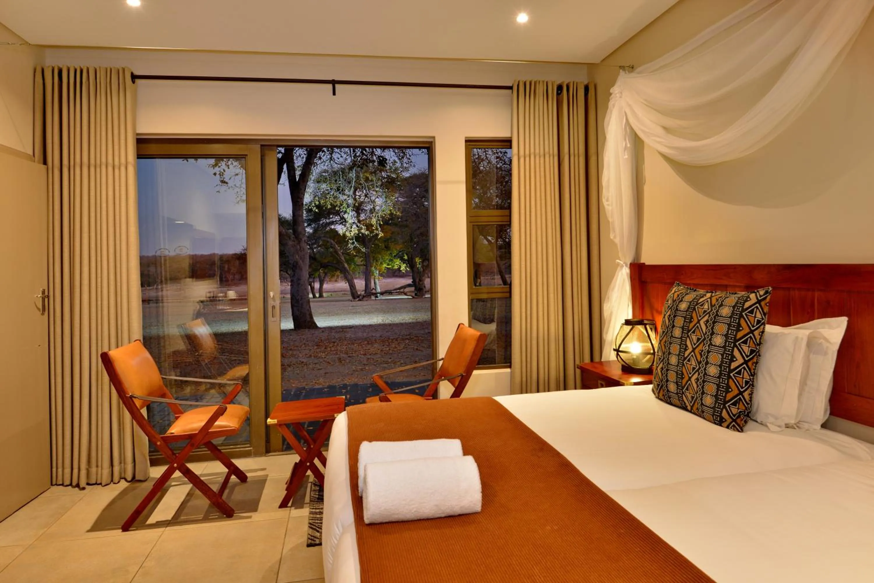View (from property/room), Bed in Hwange Safari Lodge