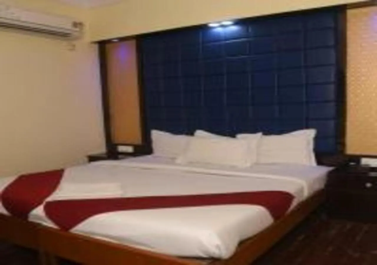Bed in Hotel Rajhans International