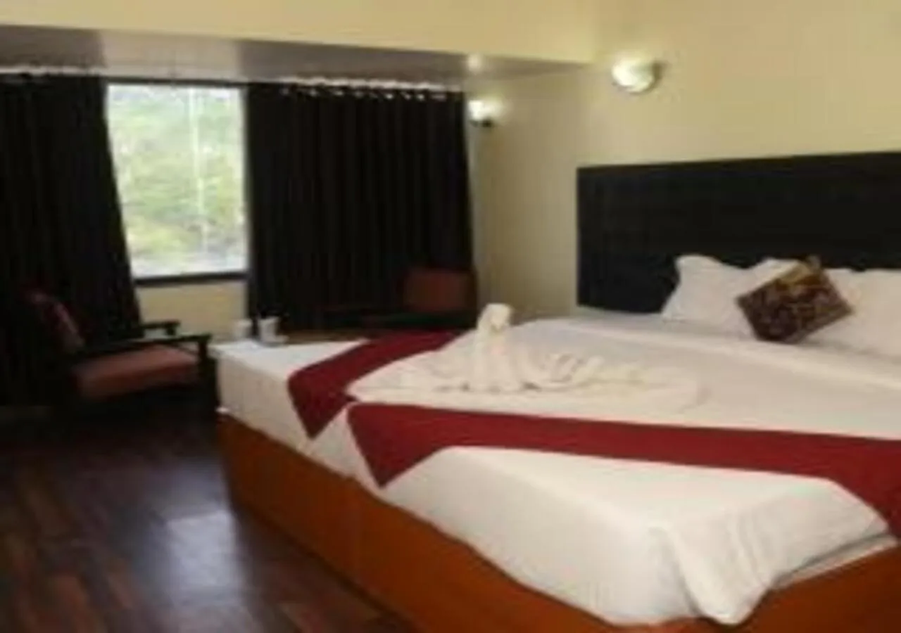 Bedroom in Hotel Rajhans International